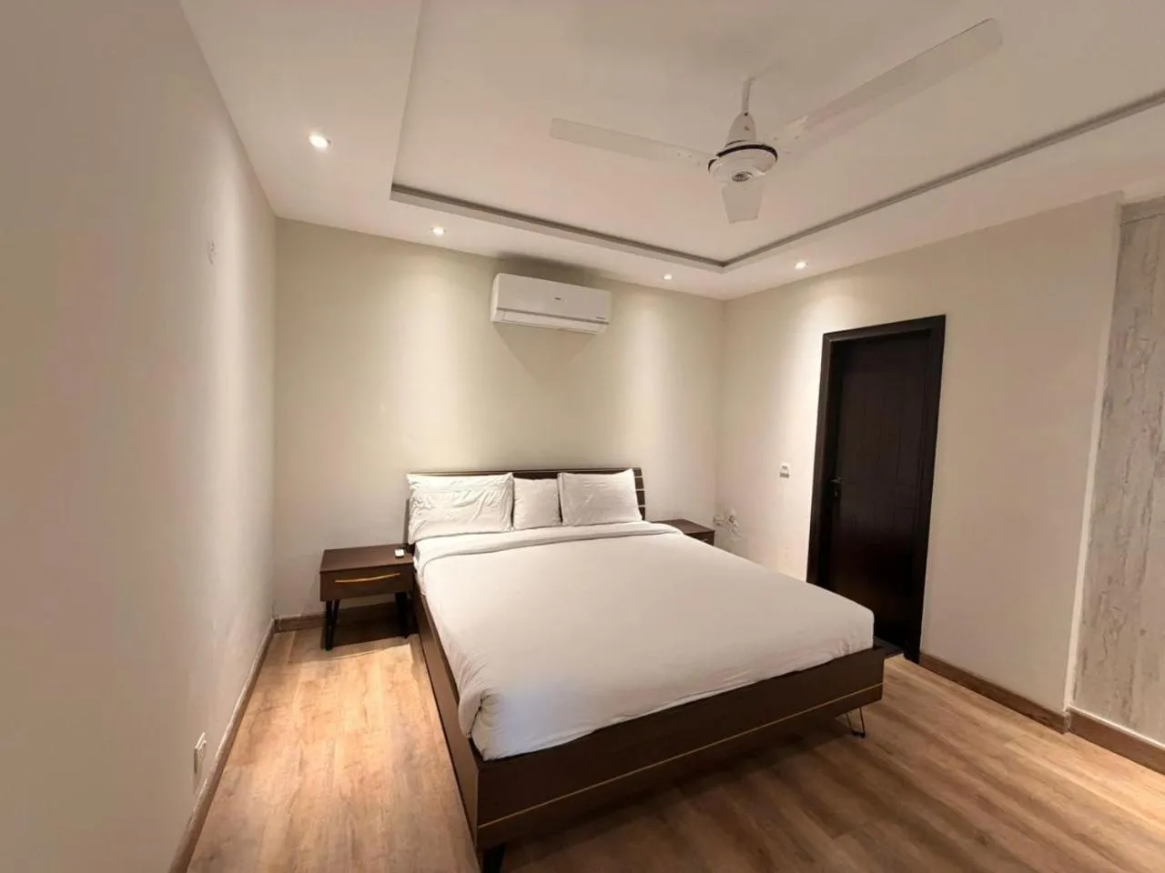 Bed in The Opus Luxury Residences