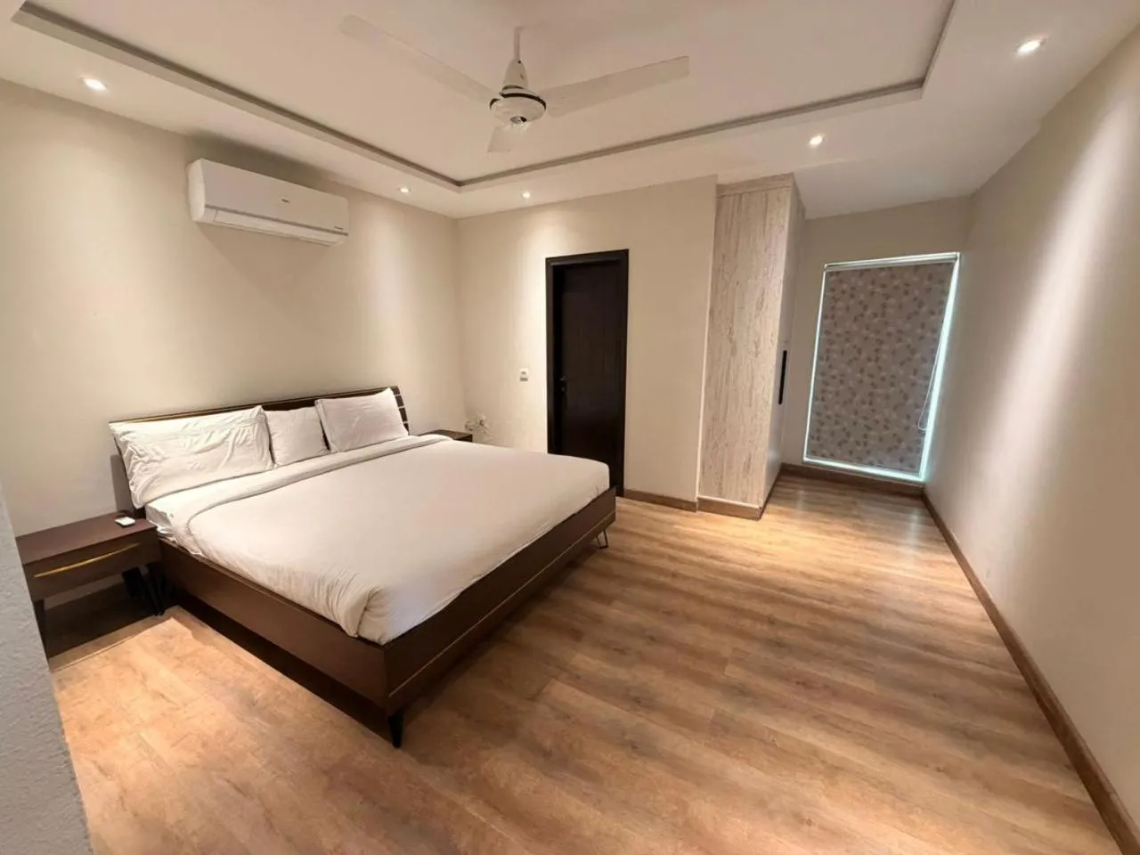 Bed in The Opus Luxury Residences