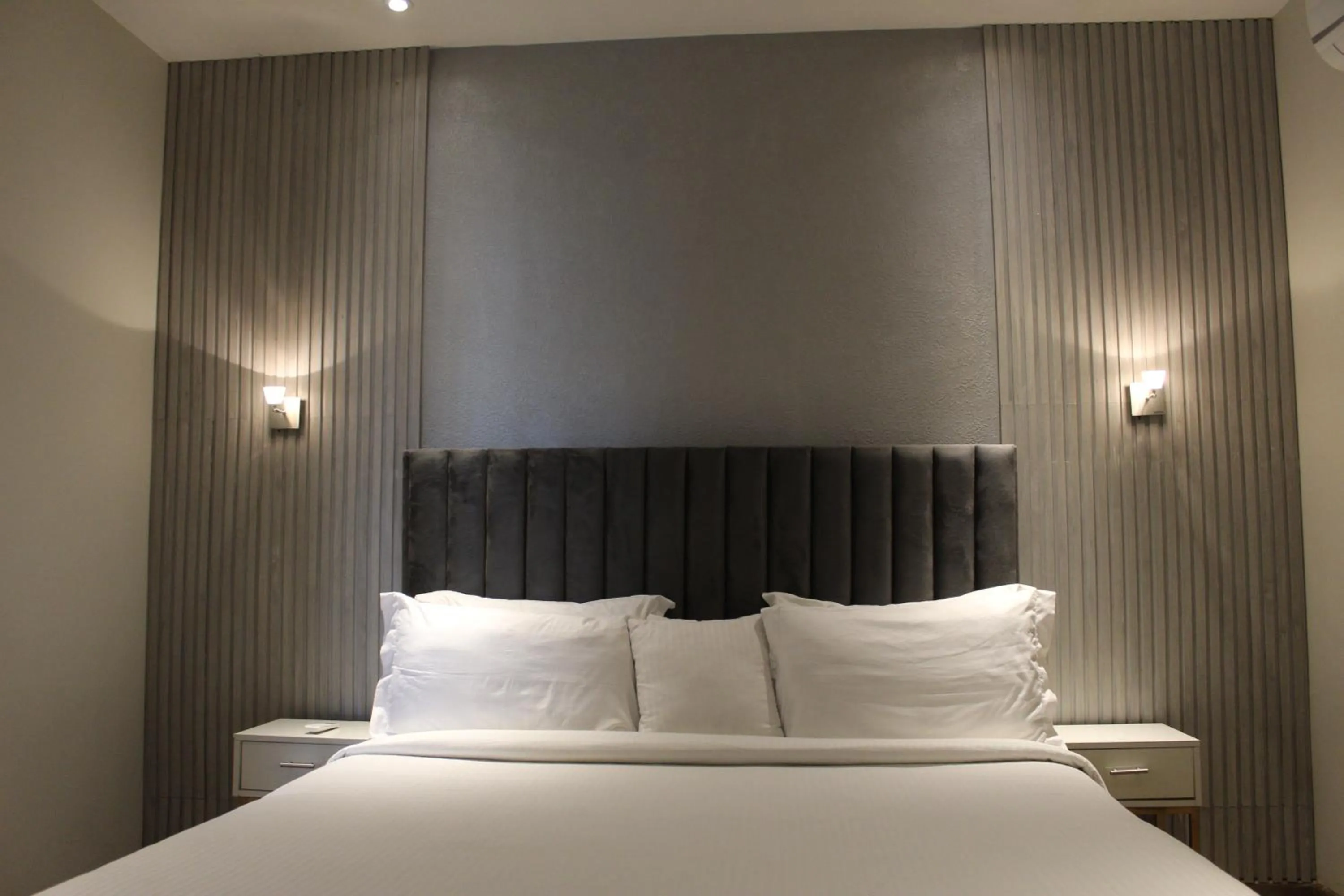 Bed in The Opus Luxury Residences