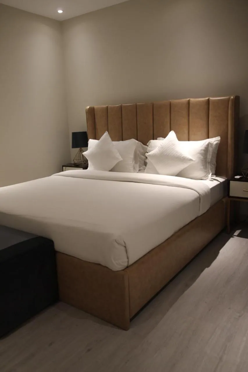 Bed in The Opus Luxury Residences