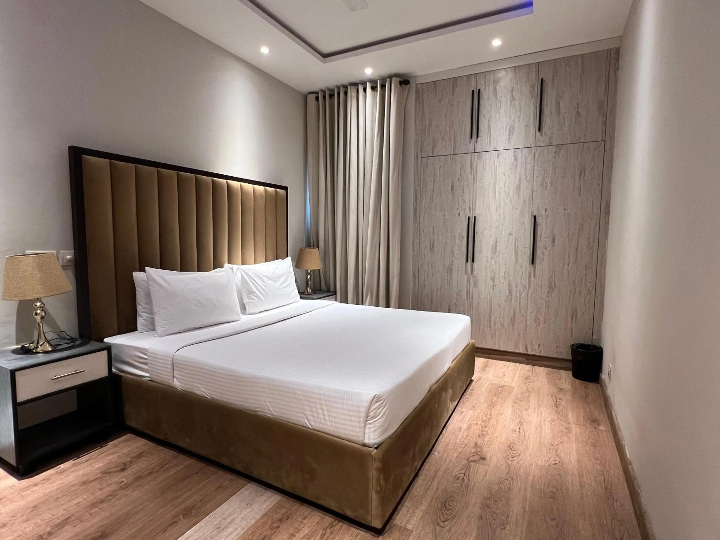 Bed in The Opus Luxury Residences