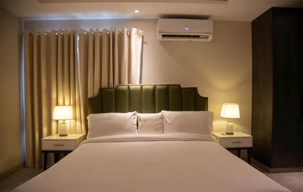 Bed in The Opus Luxury Residences