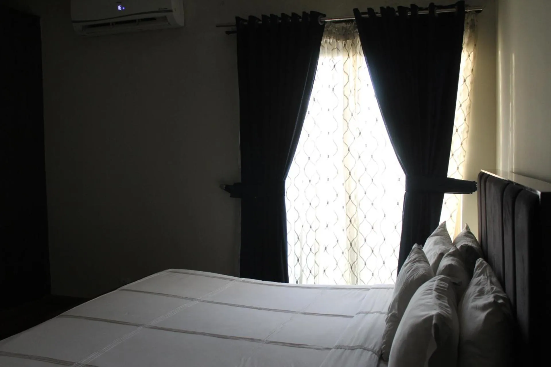 Bed in The Opus Luxury Residences