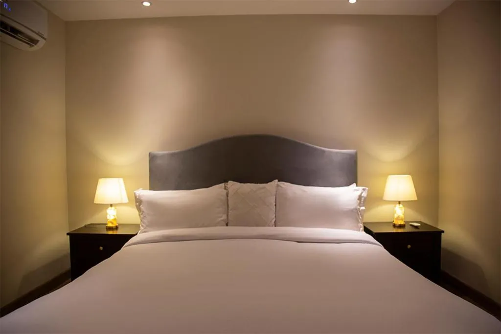 Bed in The Opus Luxury Residences