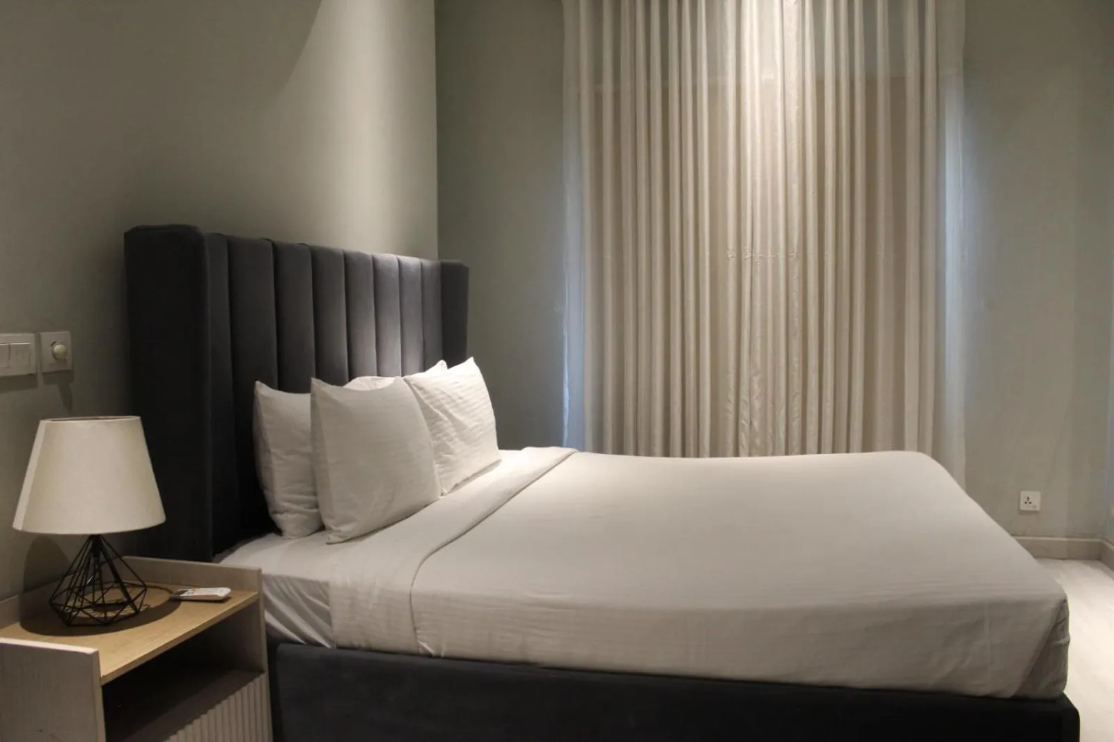 Bed in The Opus Luxury Residences