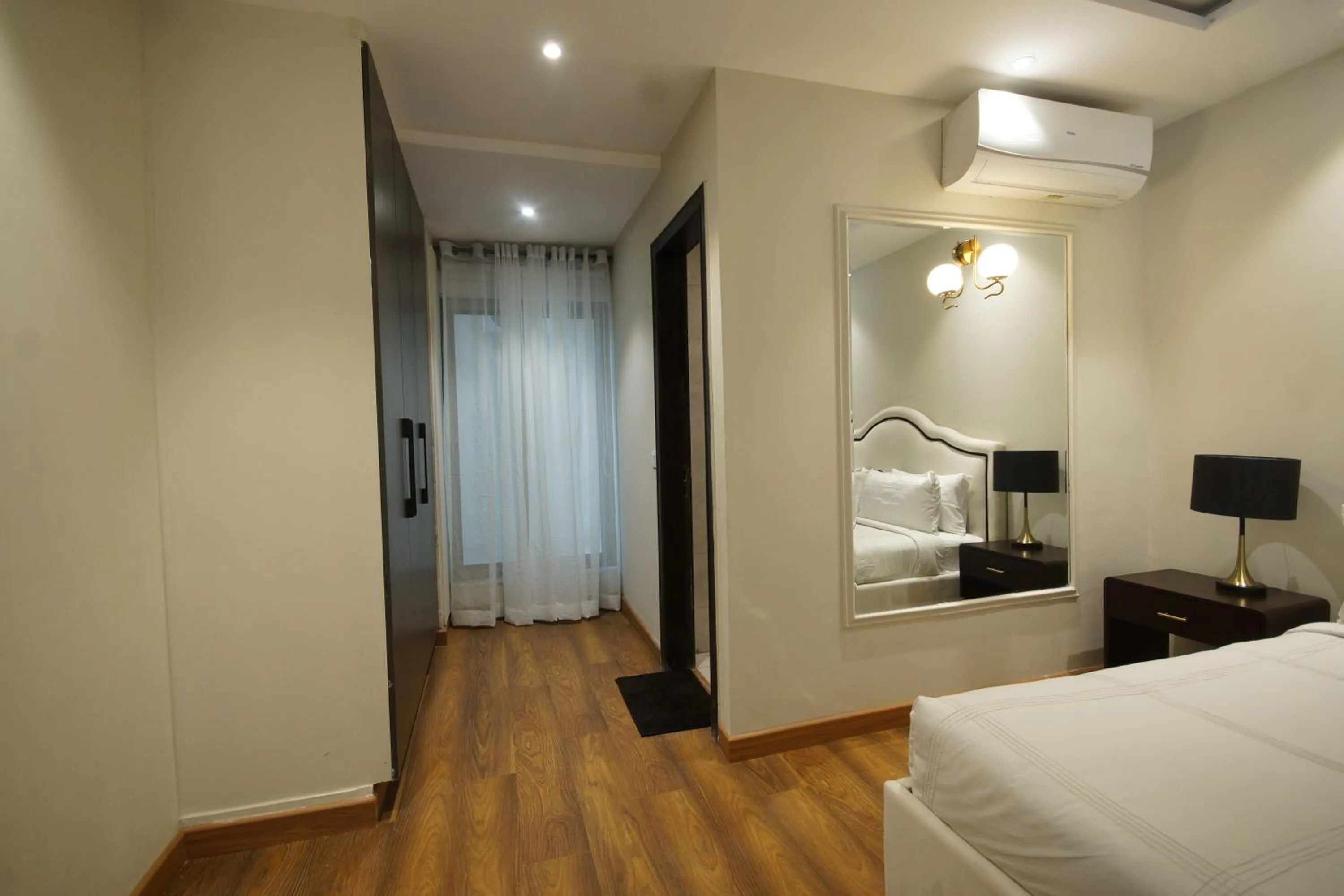 Bed in The Opus Luxury Residences