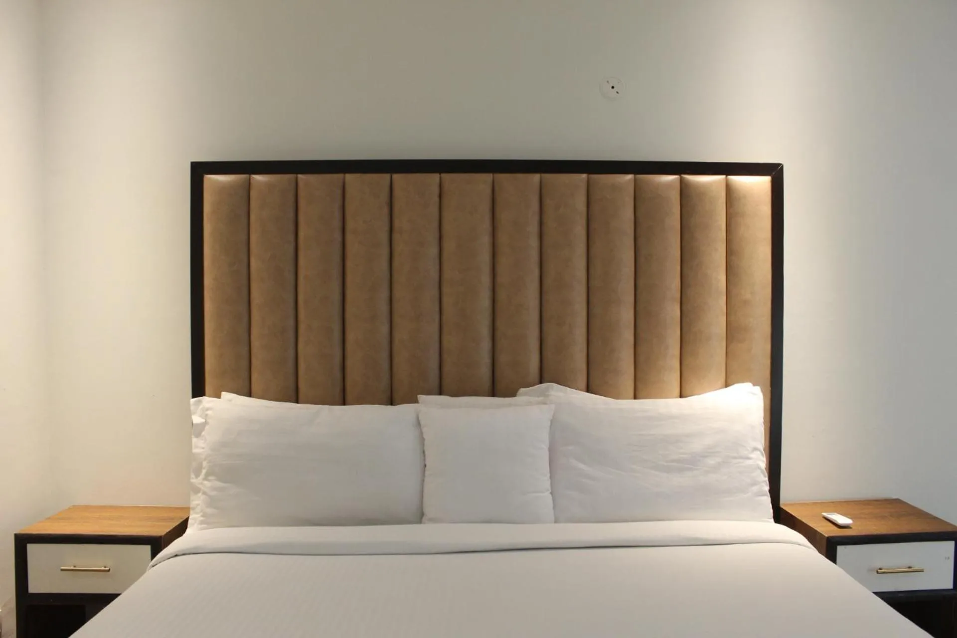 Bed in The Opus Luxury Residences