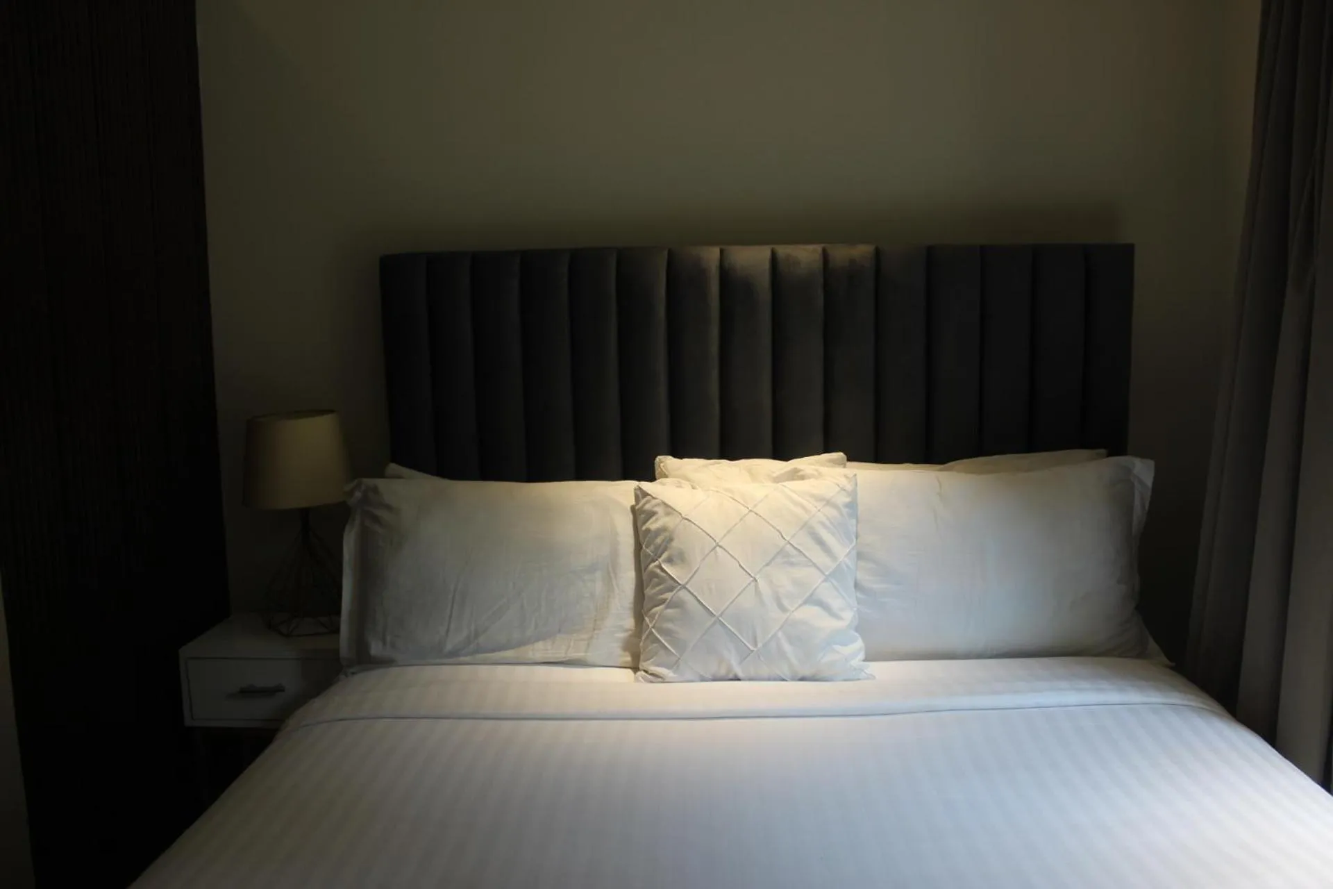 Bed in The Opus Luxury Residences