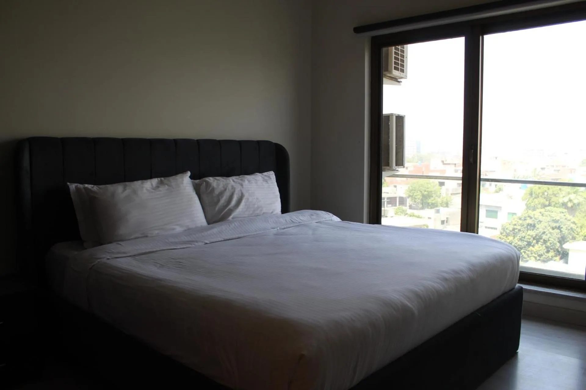 Bed in The Opus Luxury Residences