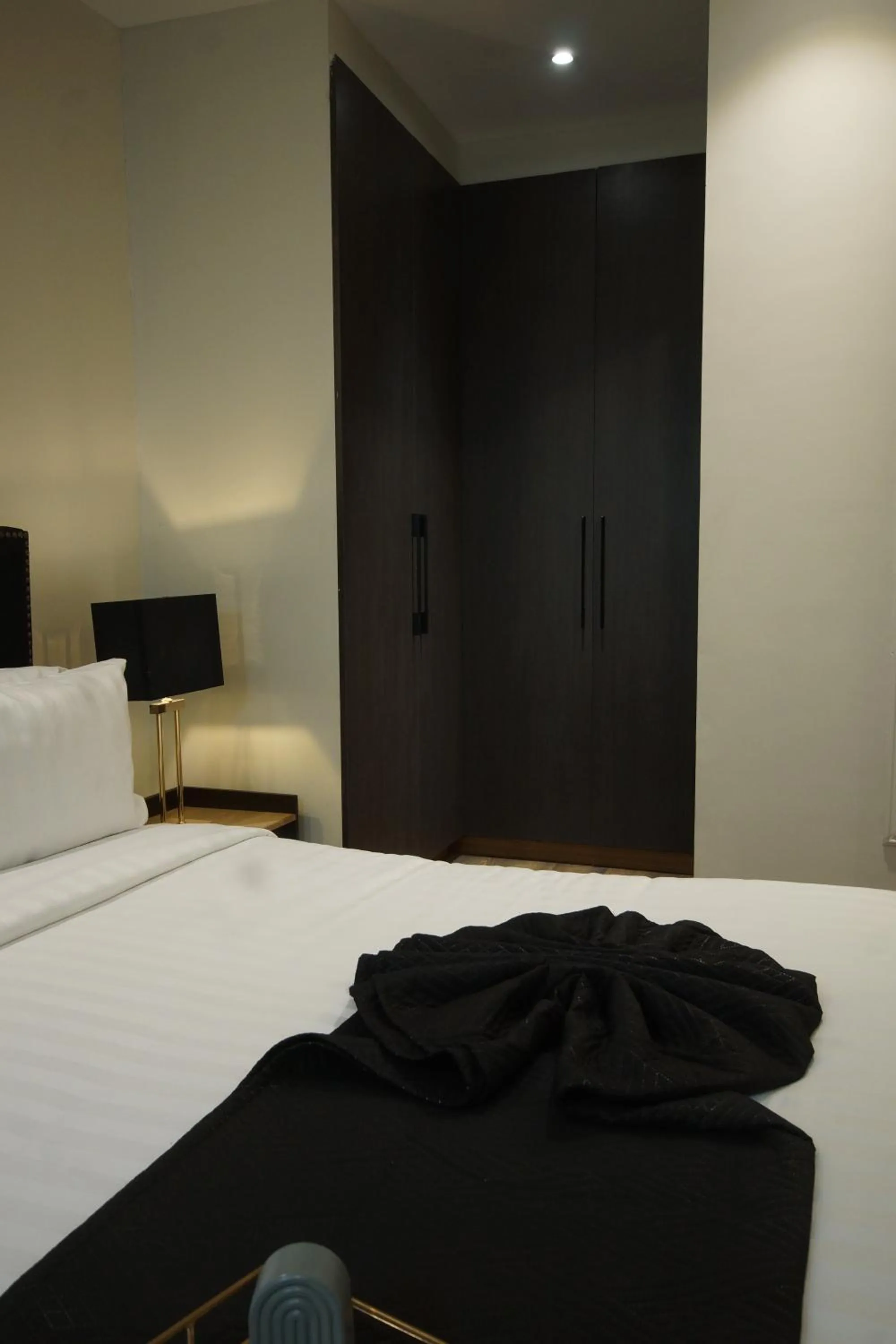 Bed in The Opus Luxury Residences