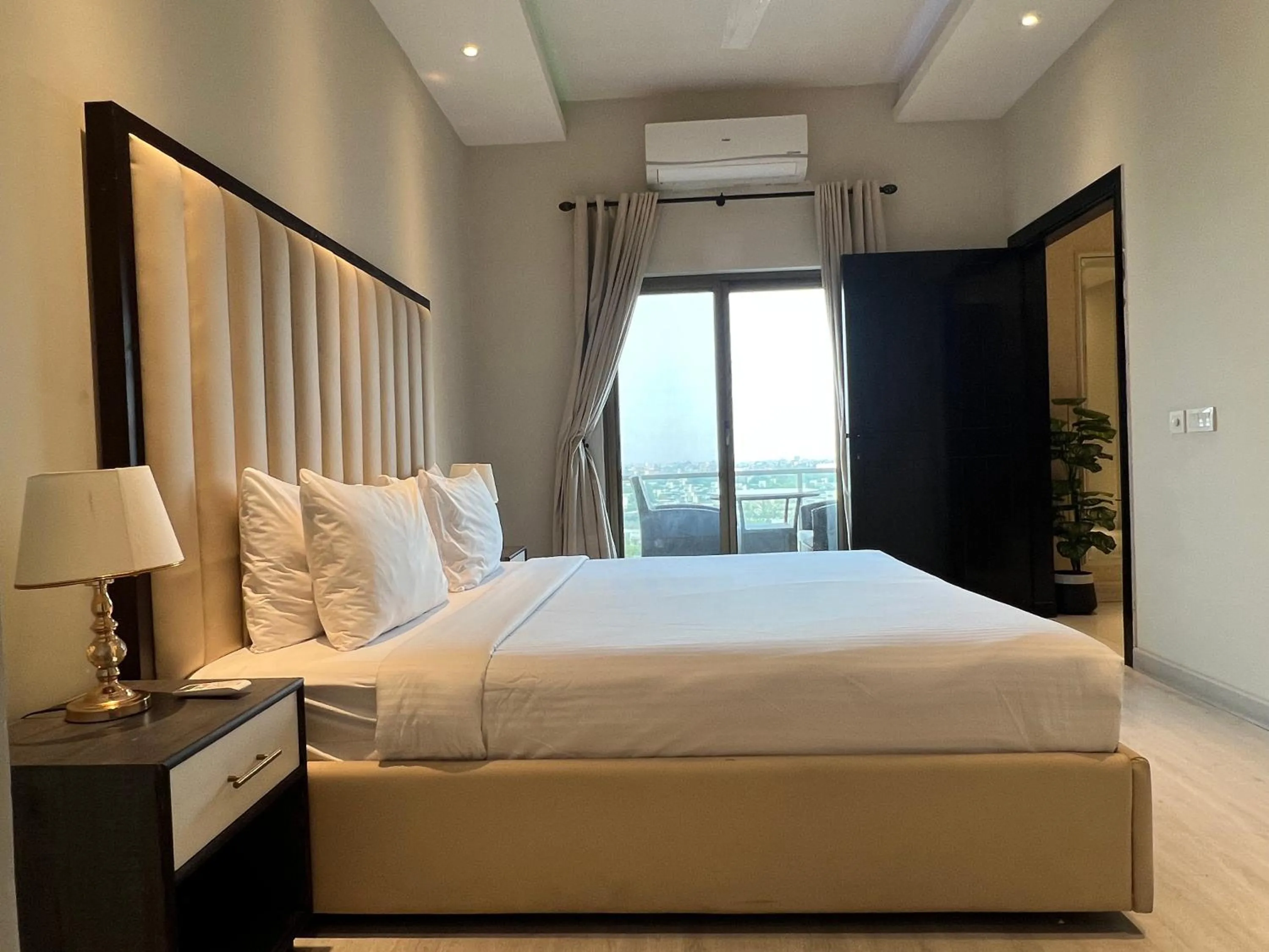 Bed in The Opus Luxury Residences