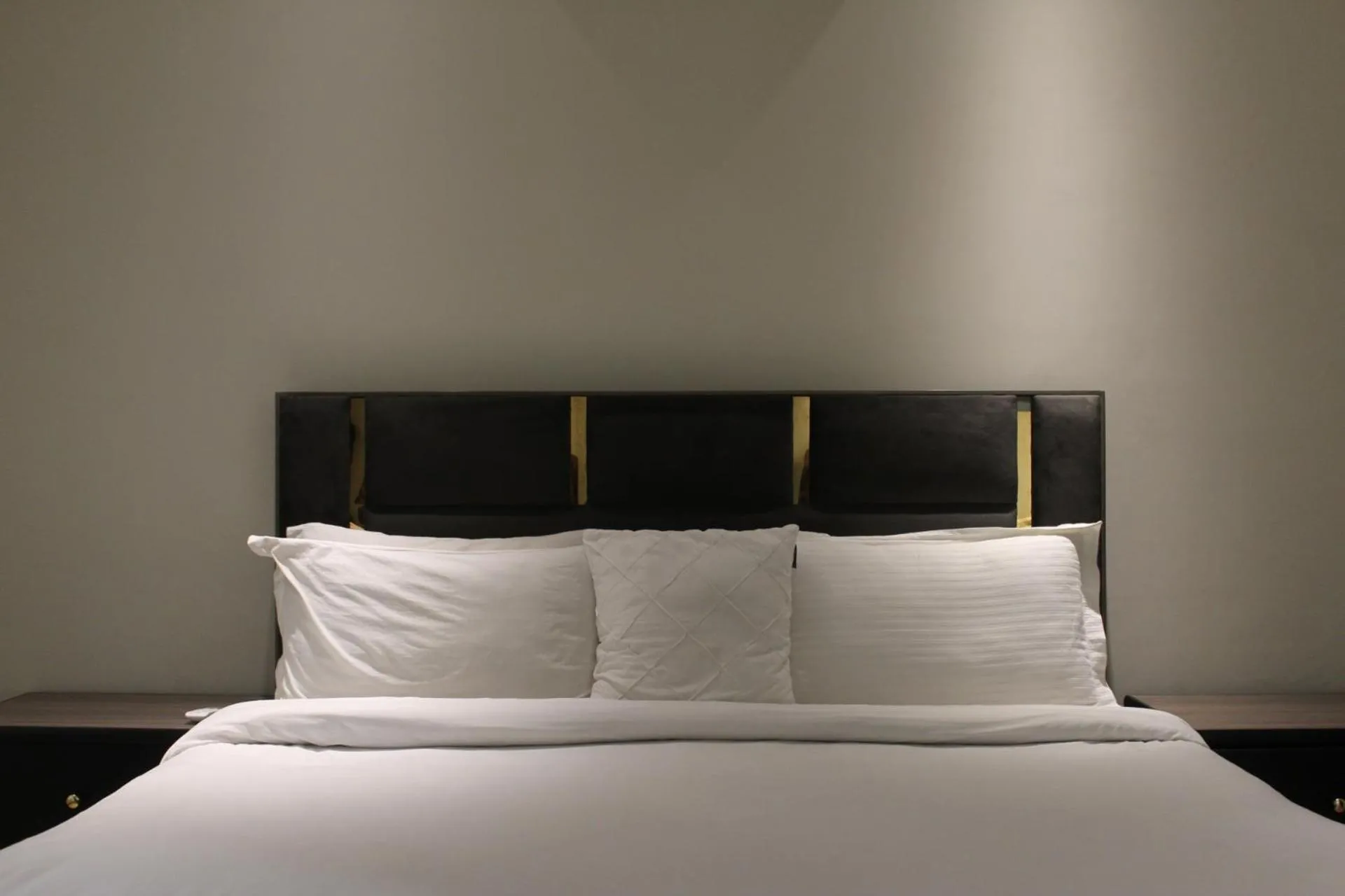 Bed in The Opus Luxury Residences
