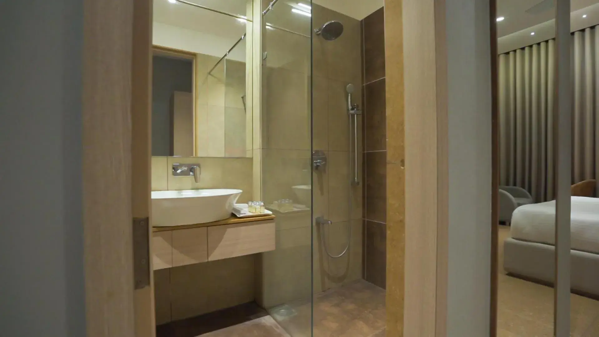 Shower, Bed in Pride Resort, Rajkot Shower, Bed in Pride Resort, Rajkot