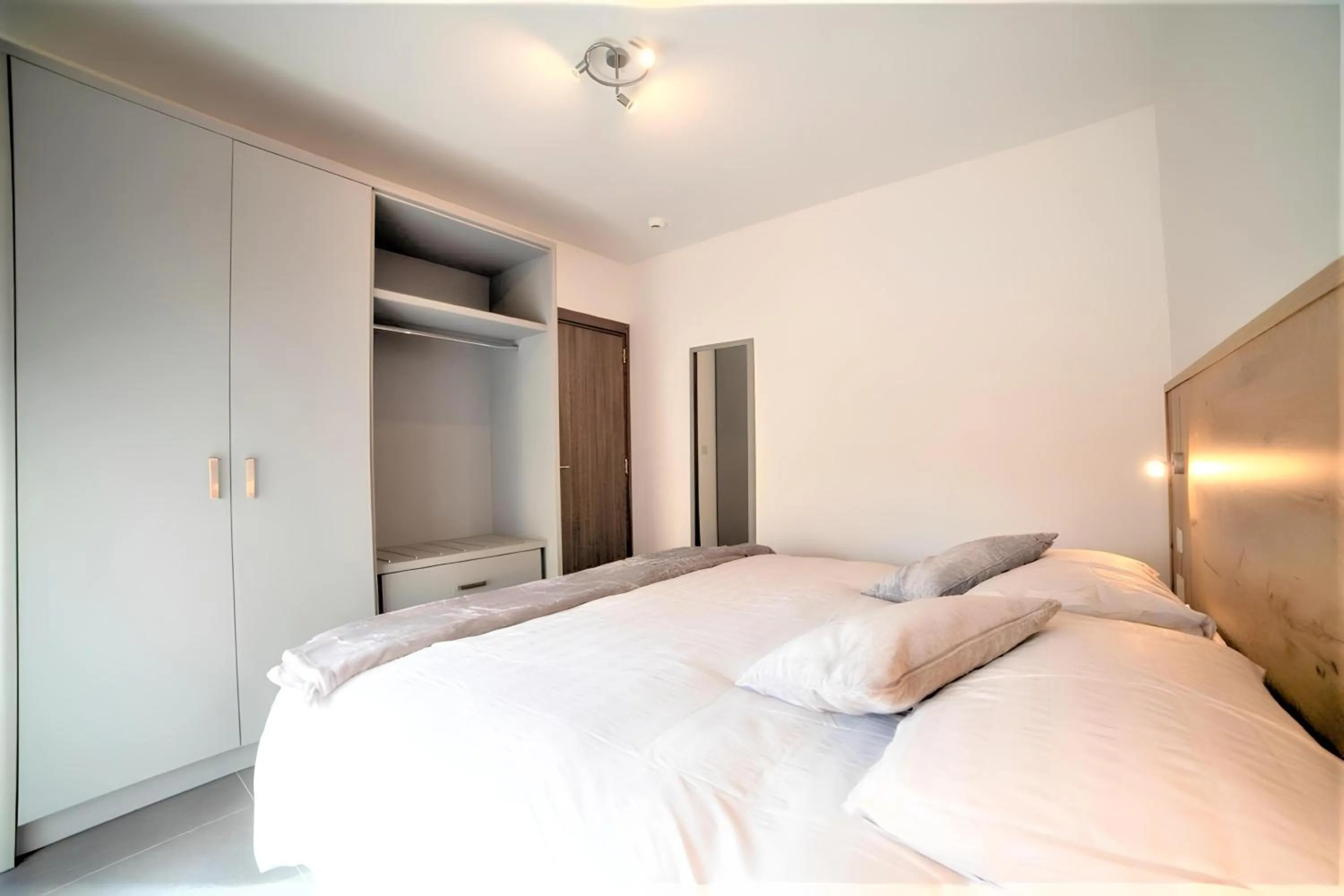 Bed in Elise Apartments