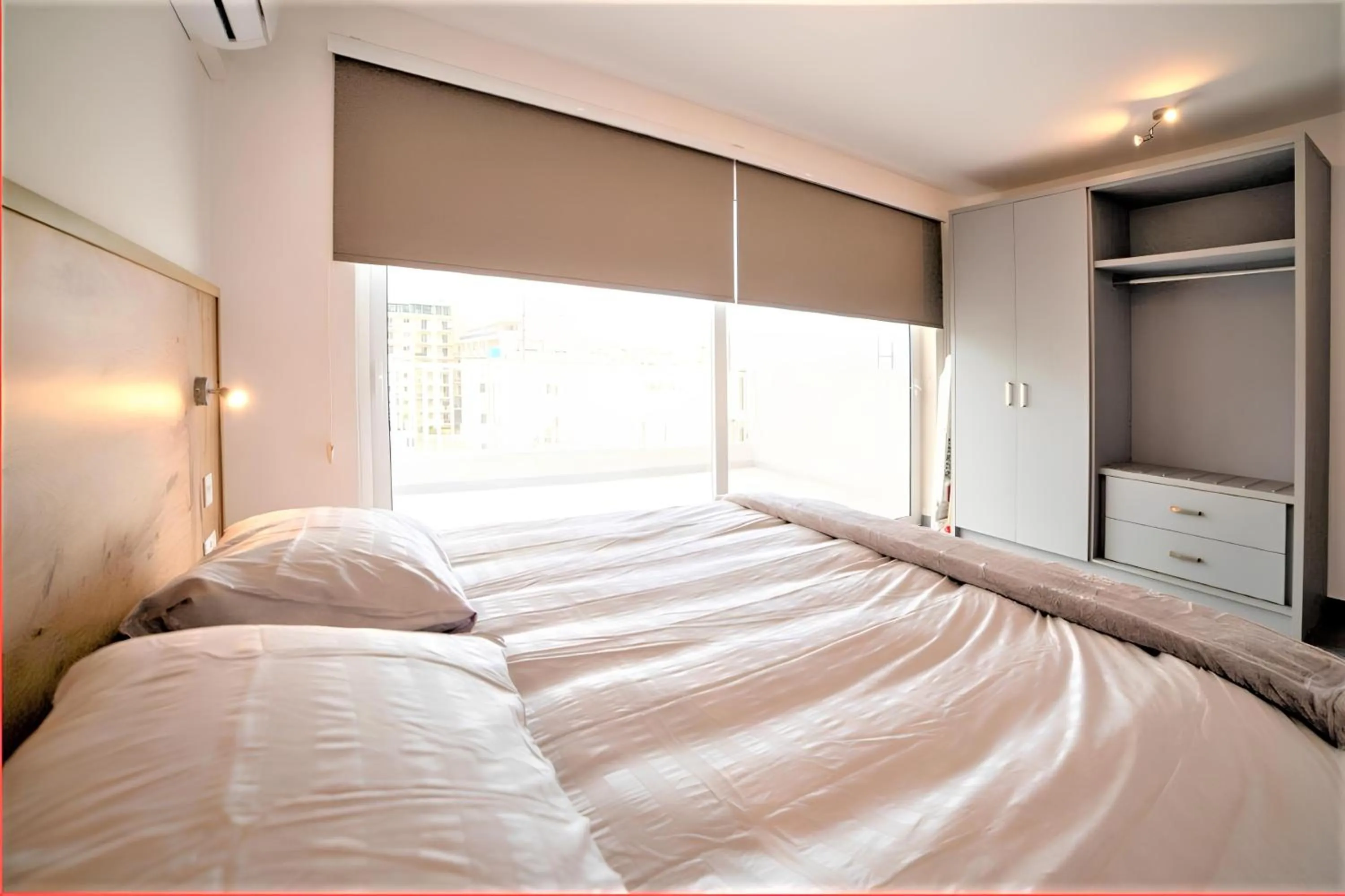 Bed in Elise Apartments