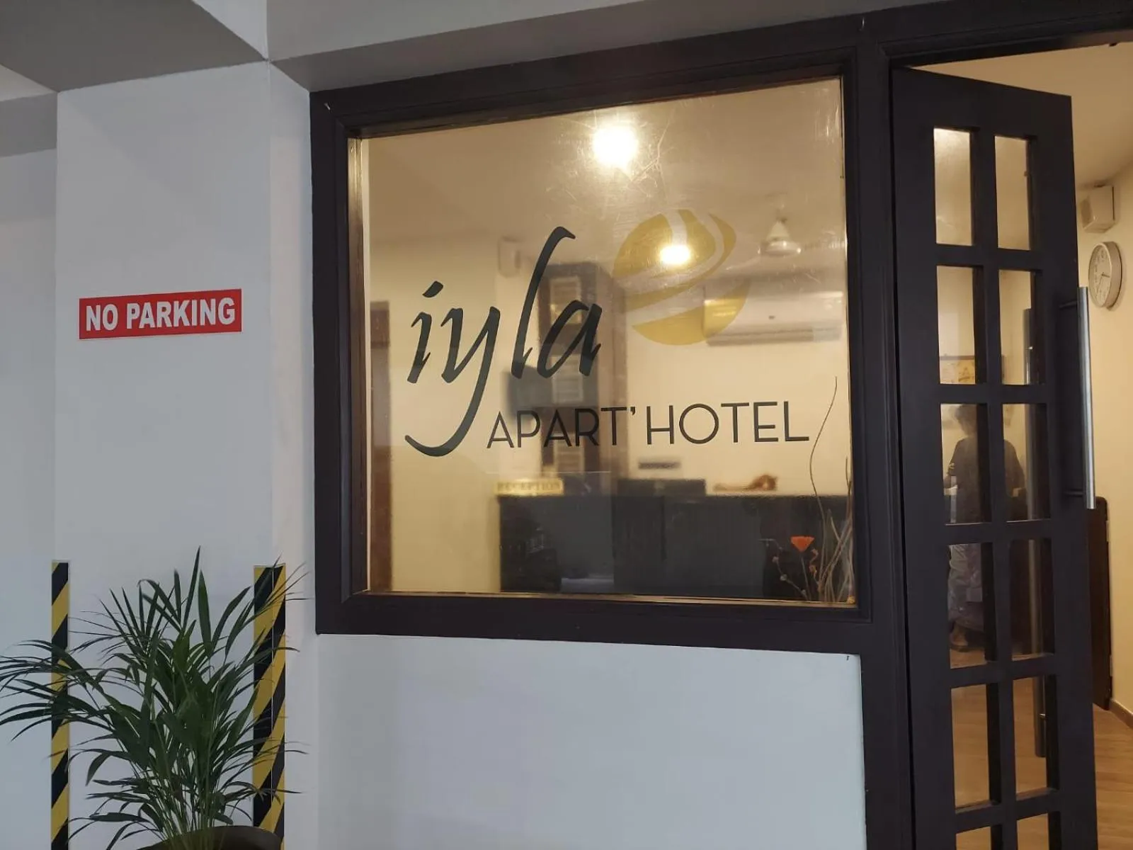 Property logo or sign in Iyla Apart Hotel