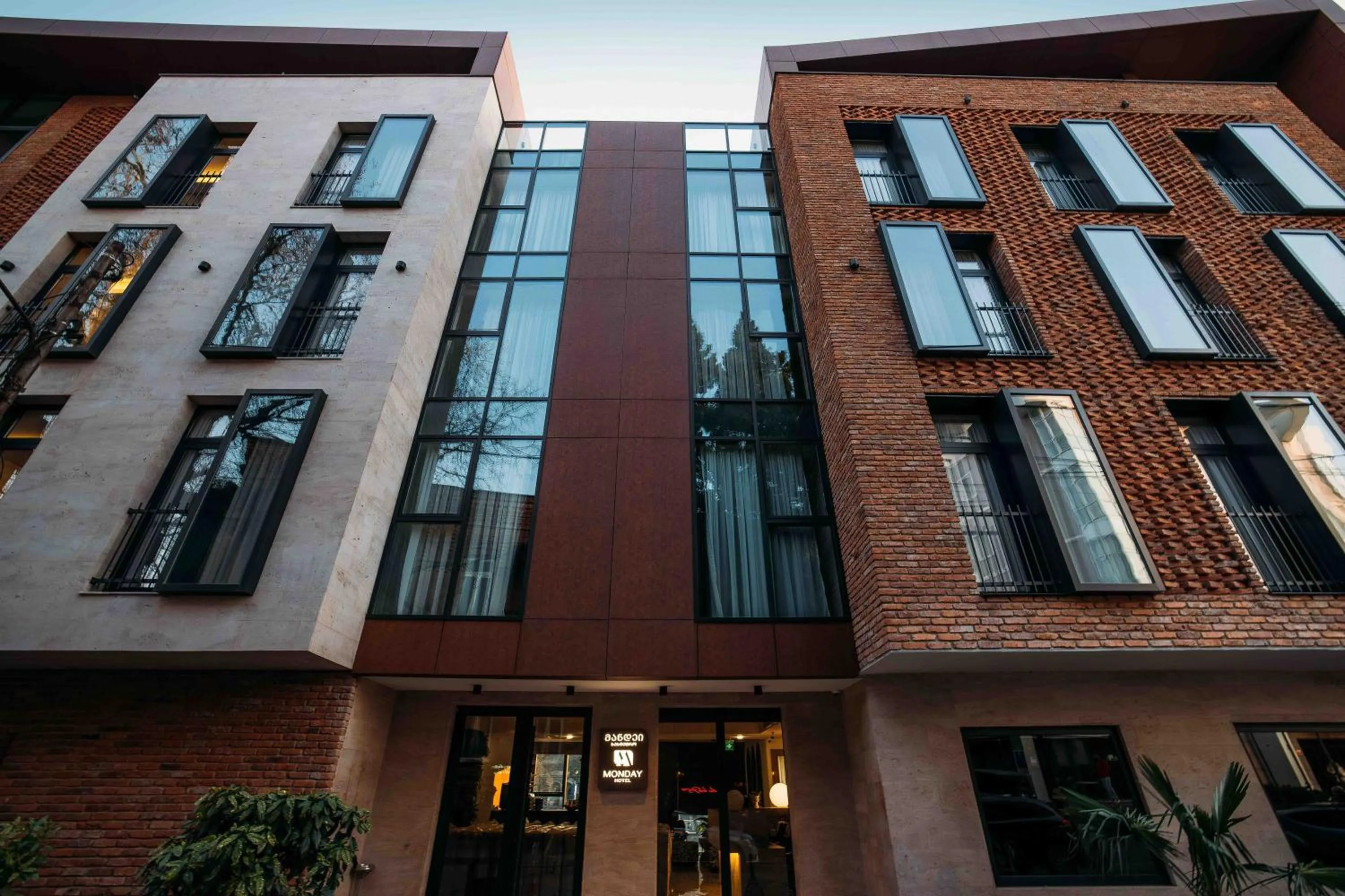 Property building in Hotel Monday by DNT Group