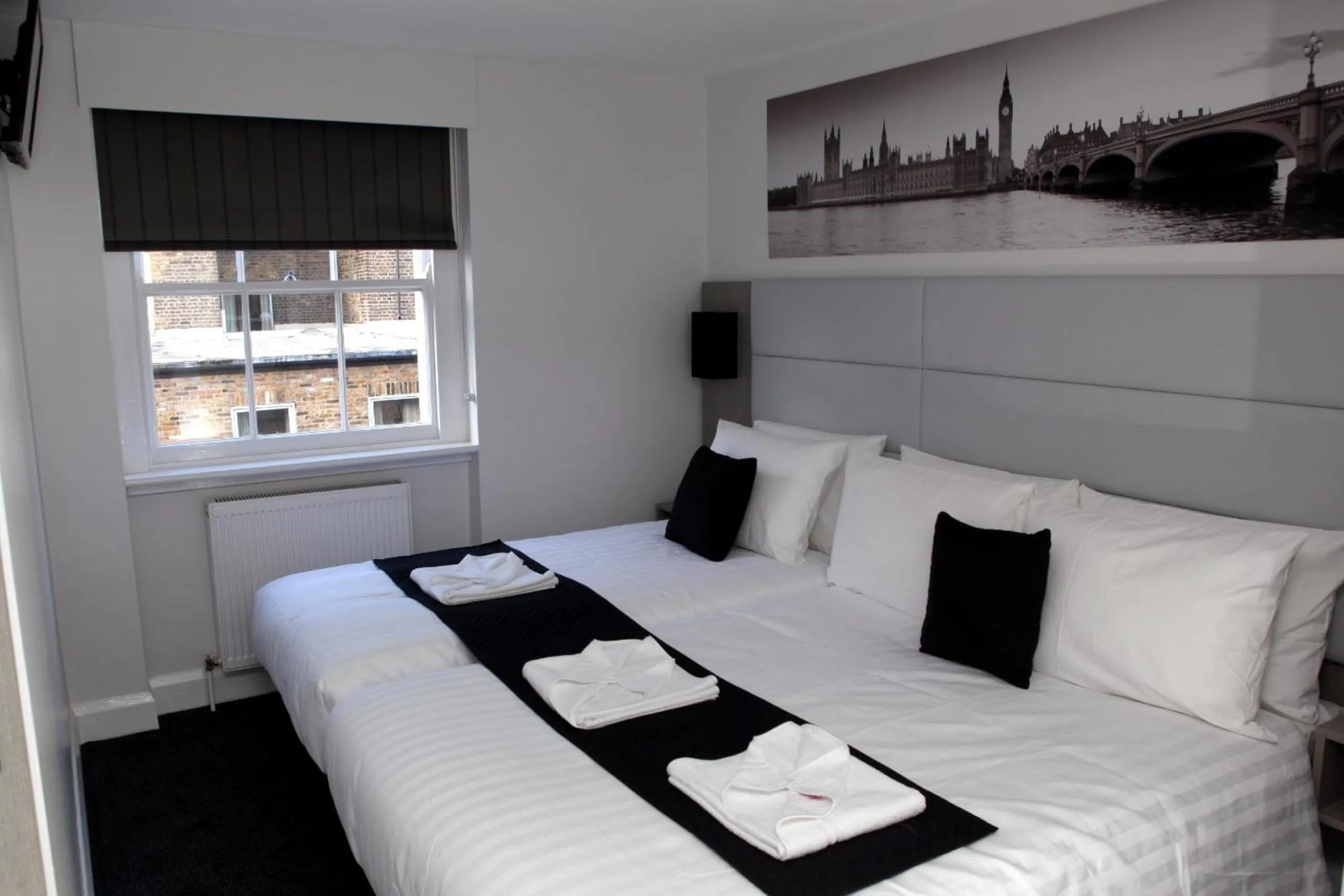 Photo of the whole room, Bed in The Omega Hotel