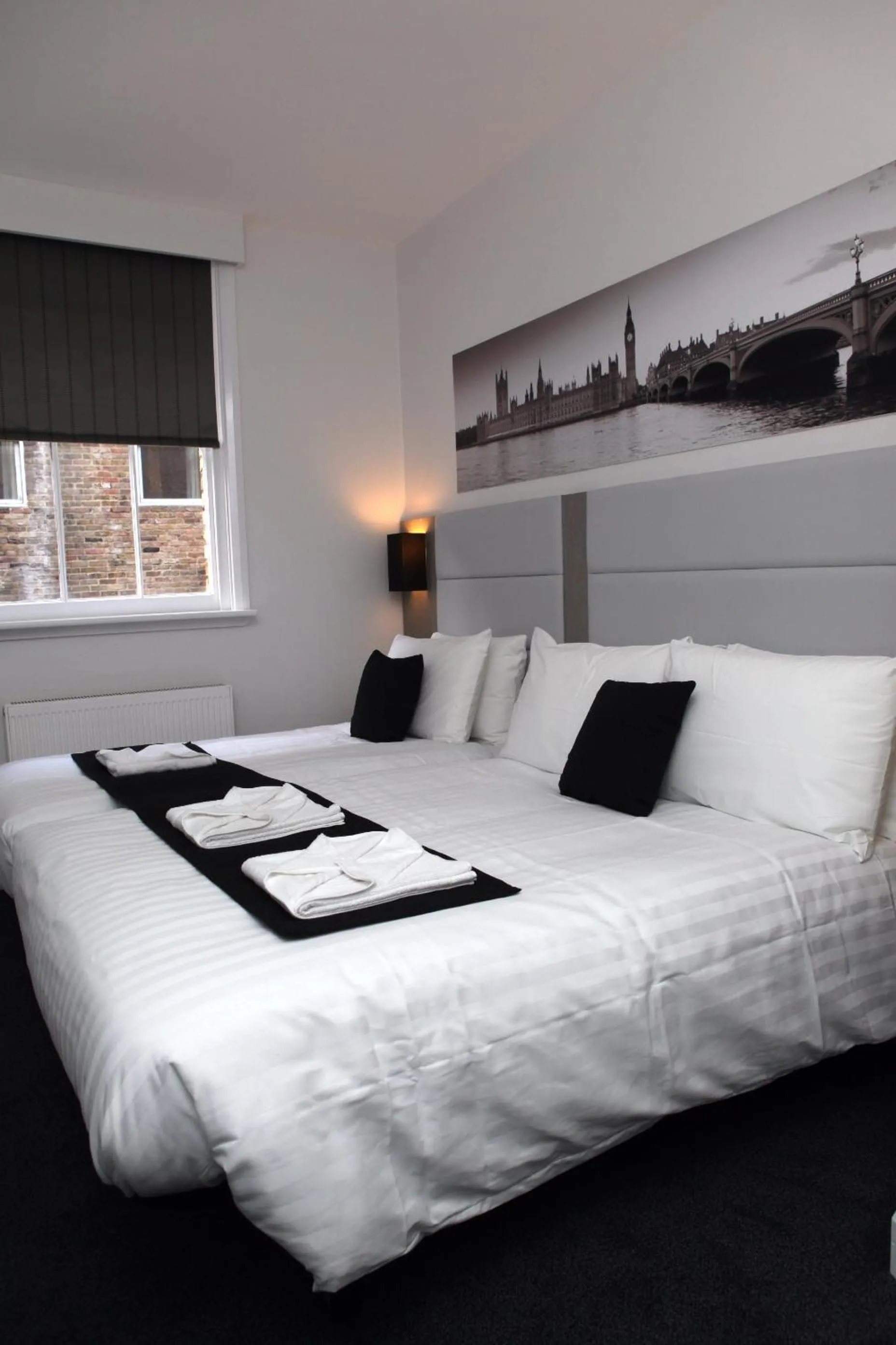 Photo of the whole room, Bed in The Omega Hotel