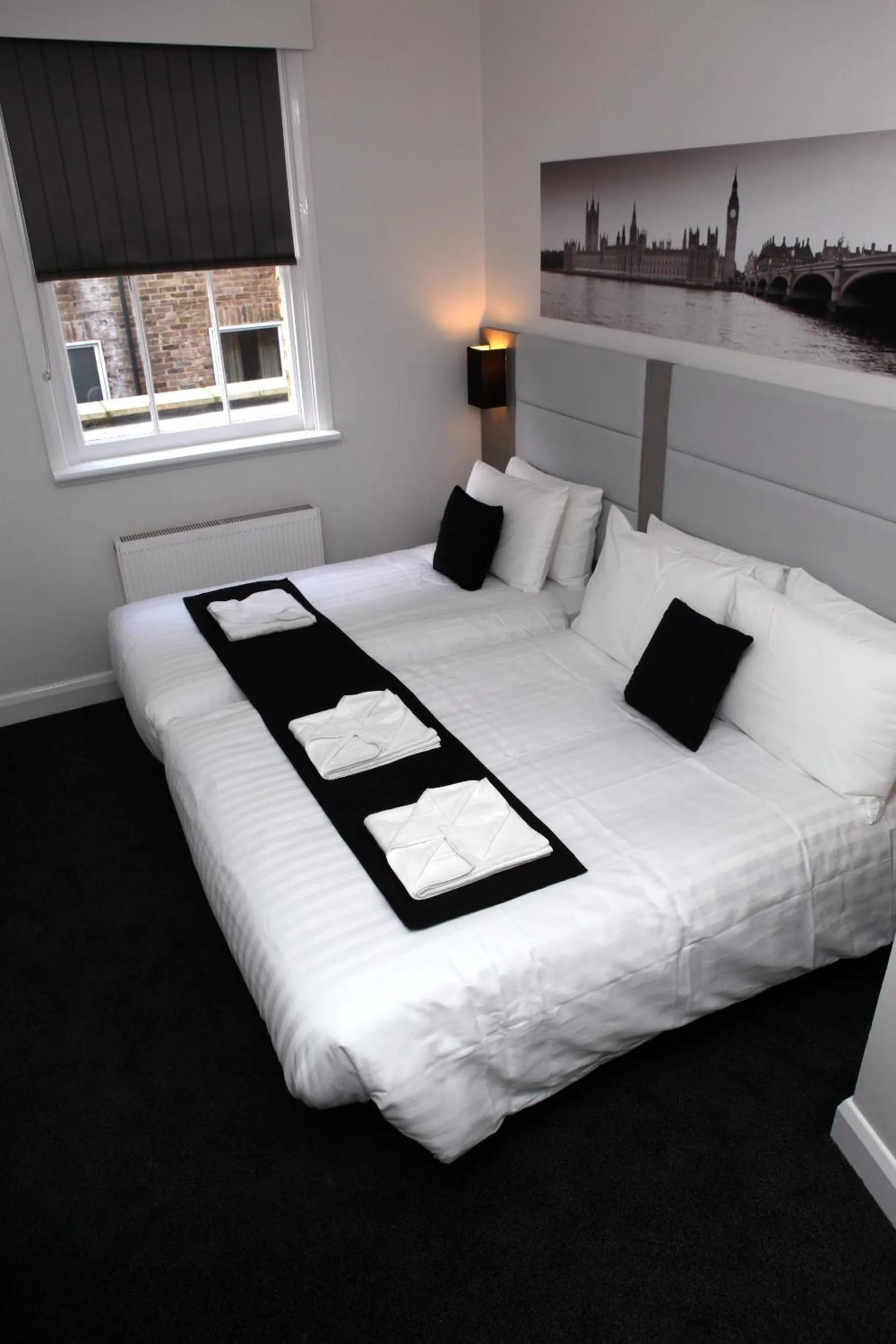 Photo of the whole room, Bed in The Omega Hotel