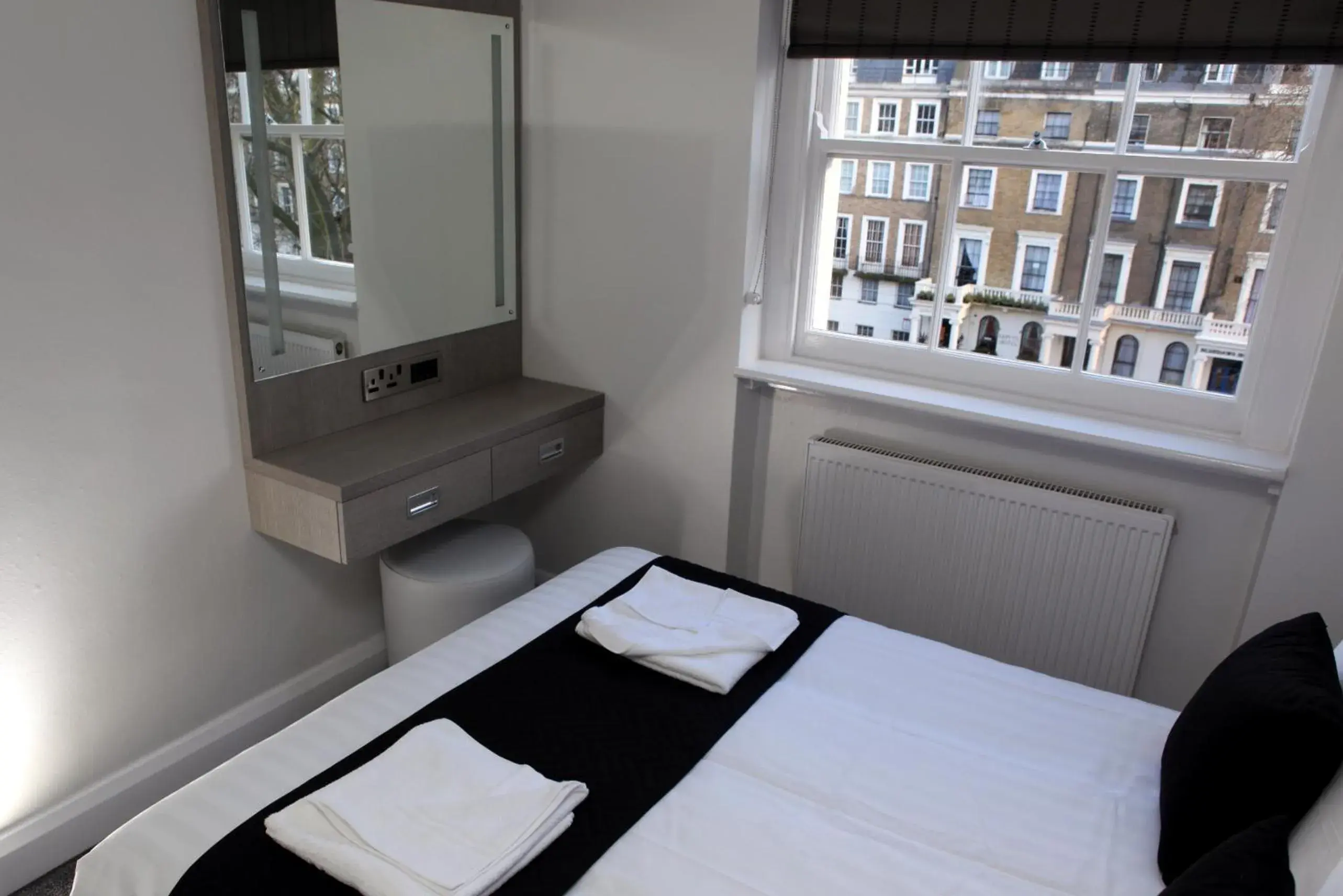 View (from property/room), Bed in The Omega Hotel View (from property/room), Bed in The Omega Hotel