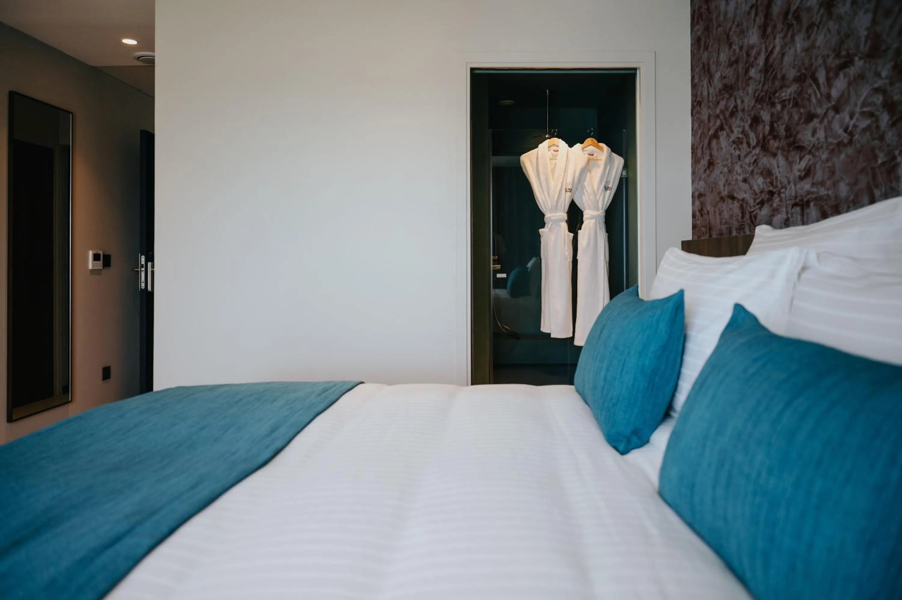 Bed in Sable Bleu Boutique Hotel