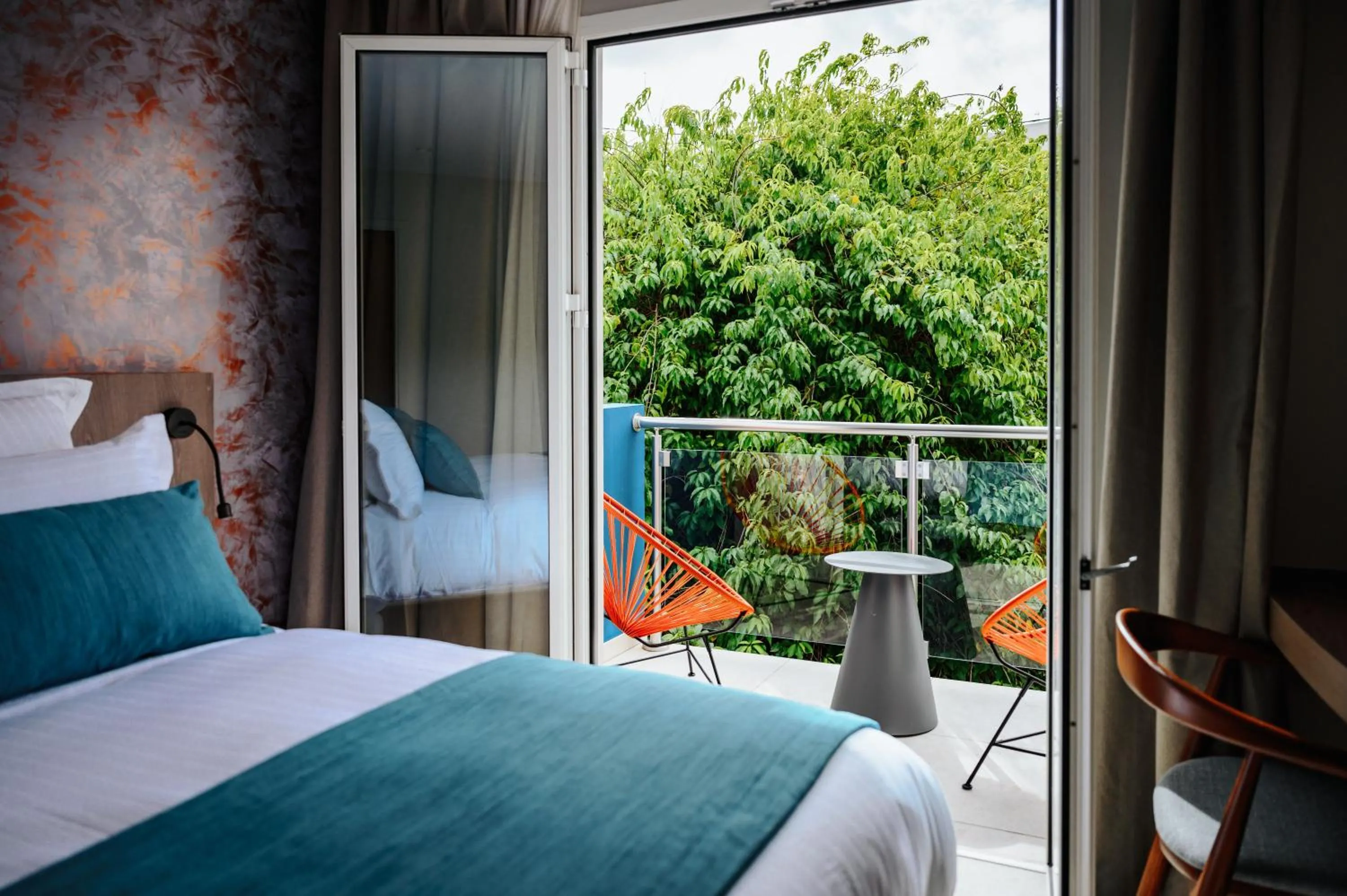 Balcony/Terrace, Bed in Sable Bleu Boutique Hotel