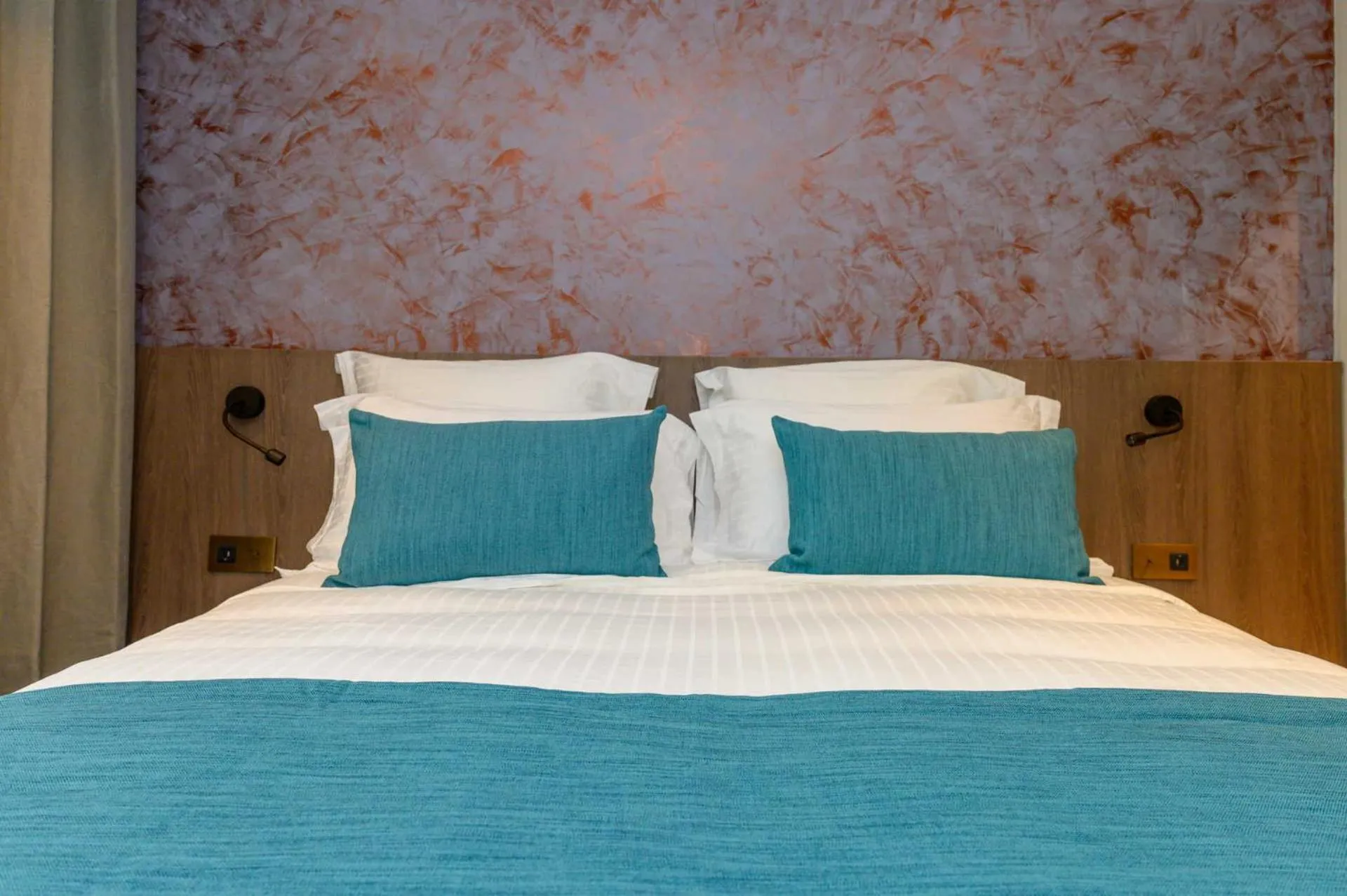 Bed in Sable Bleu Boutique Hotel