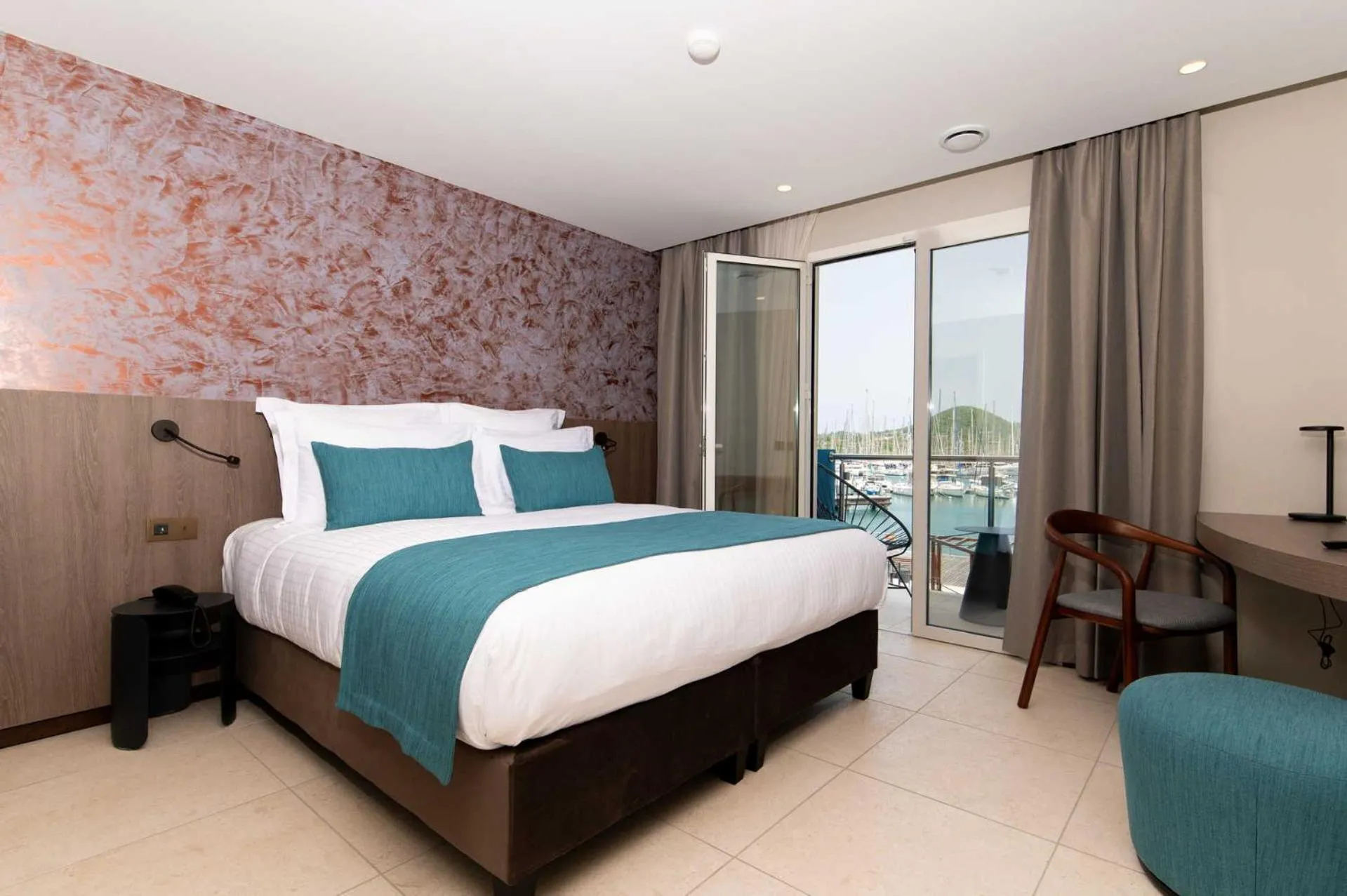 Bed in Sable Bleu Boutique Hotel