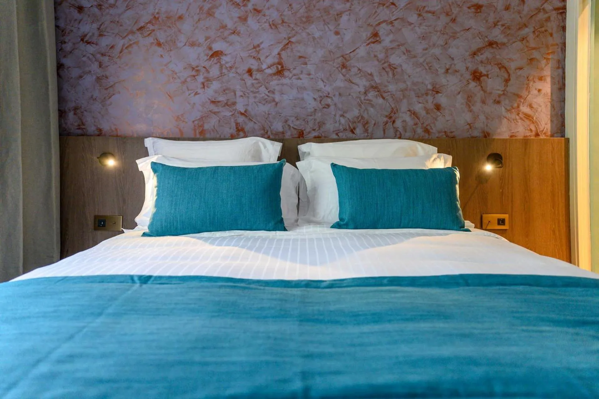 Bed in Sable Bleu Boutique Hotel