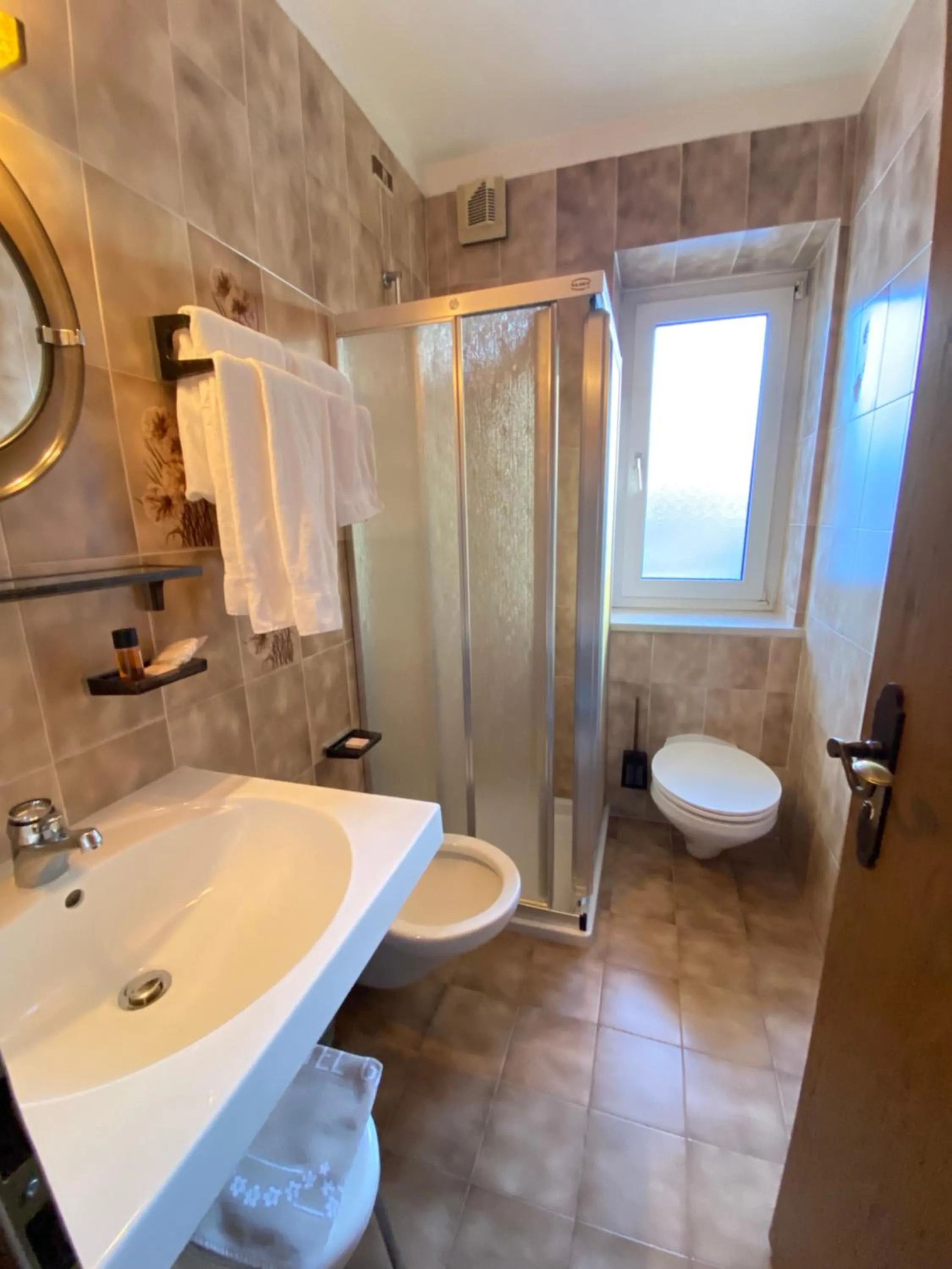 Bathroom in Affittacamere Garden Cavalese