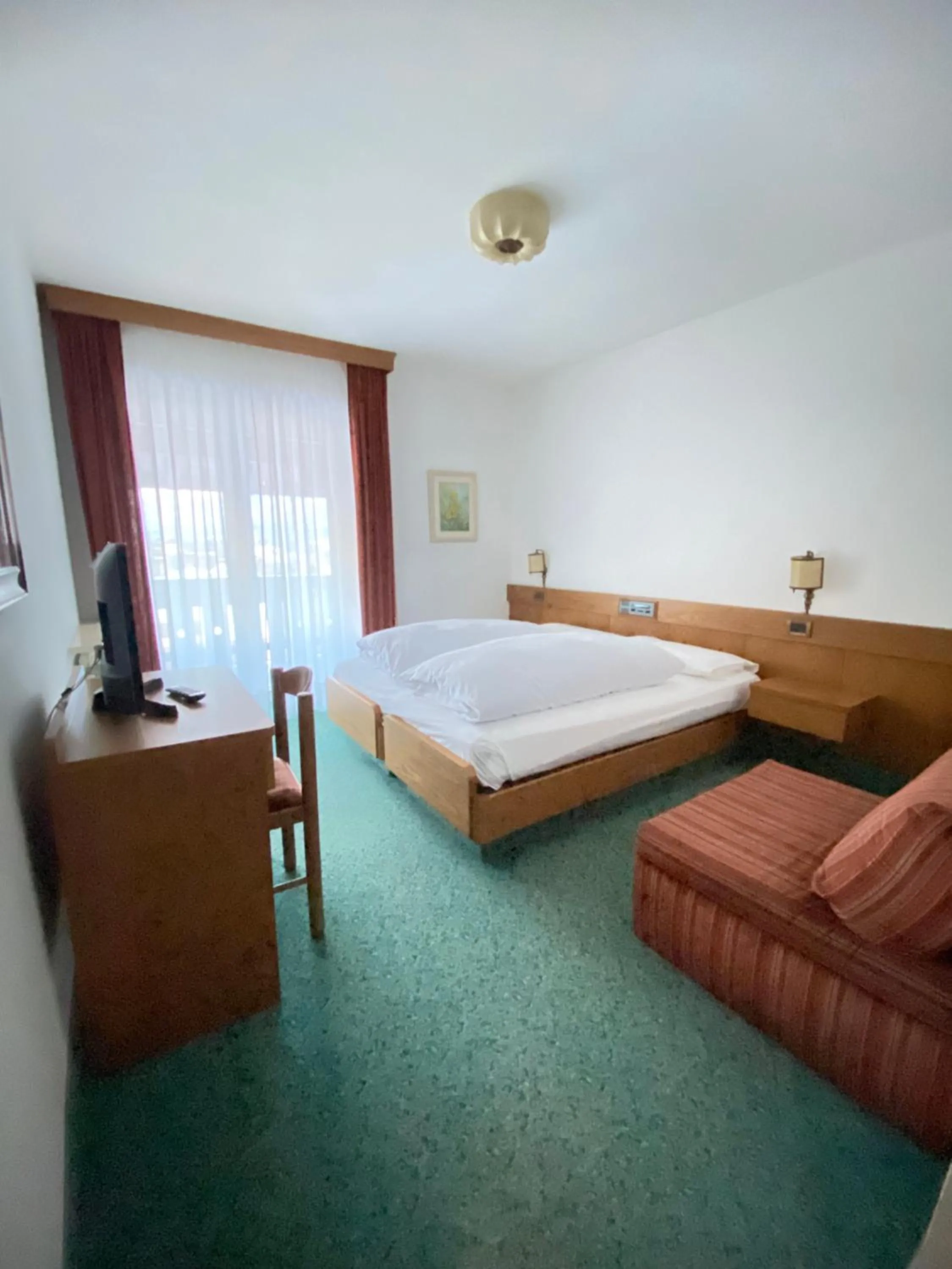 Bedroom, Bed in Affittacamere Garden Cavalese