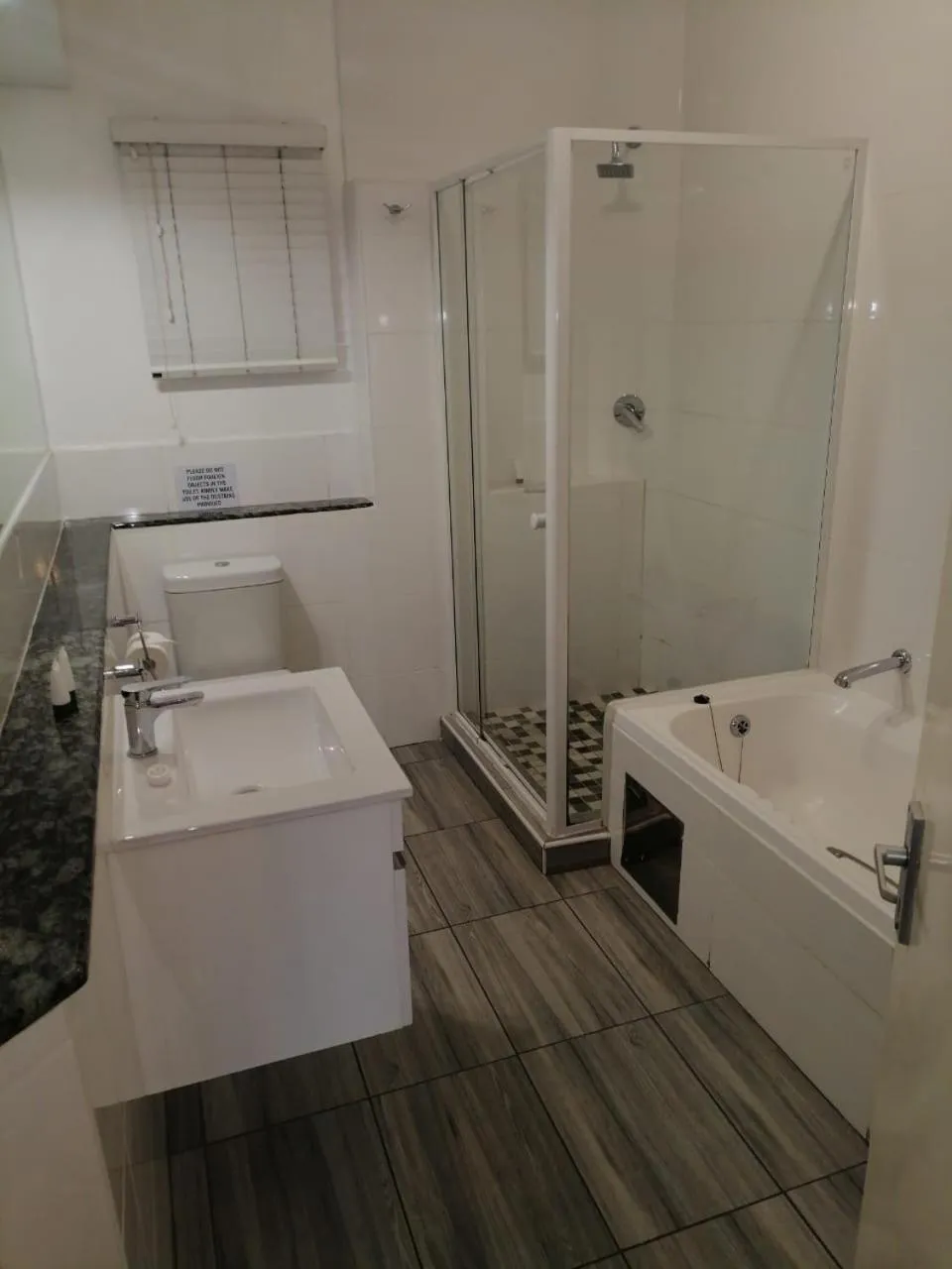 Bathroom in Airport Inn and Suites