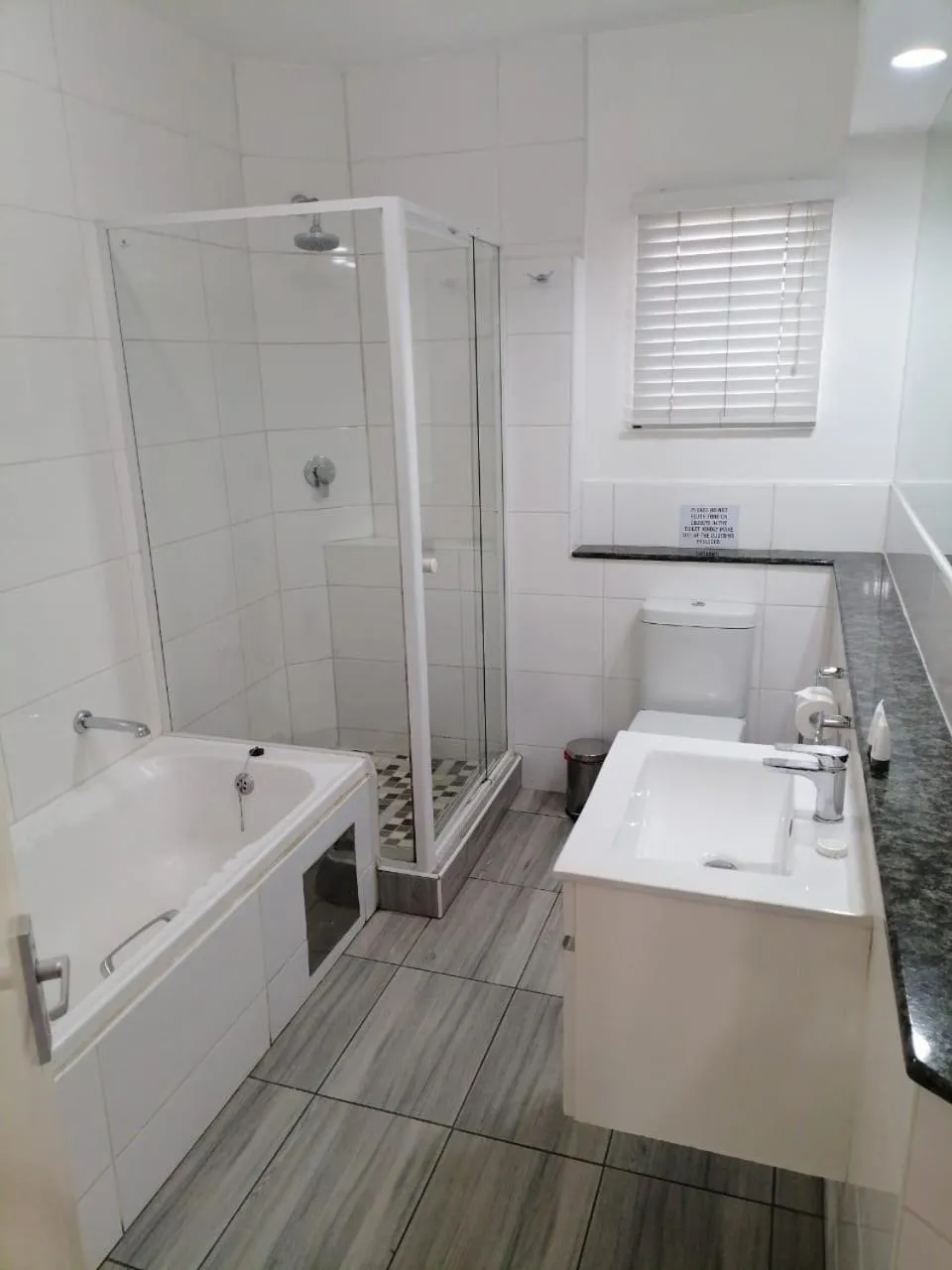 Shower in Airport Inn and Suites