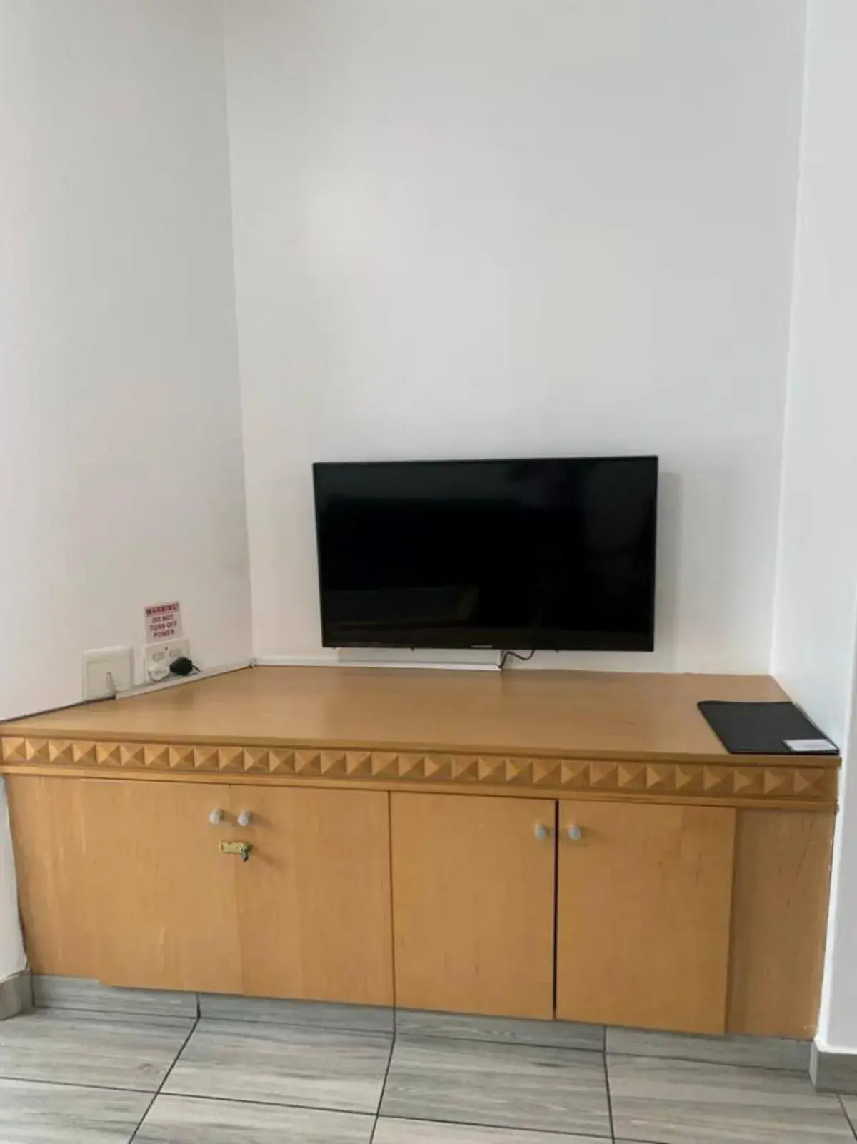 Living room in Airport Inn and Suites Living room in Airport Inn and Suites