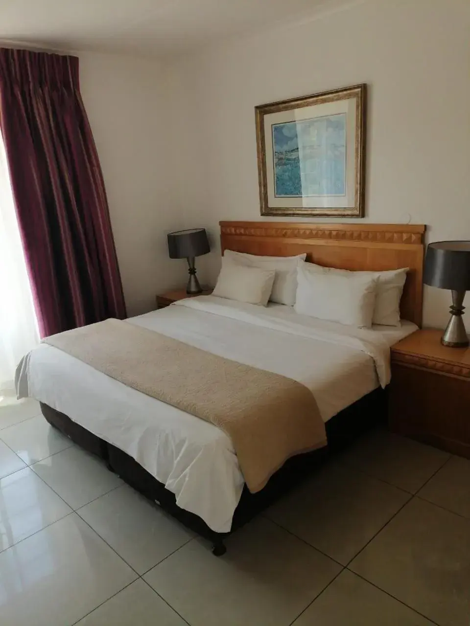 Bed in Airport Inn and Suites Bed in Airport Inn and Suites