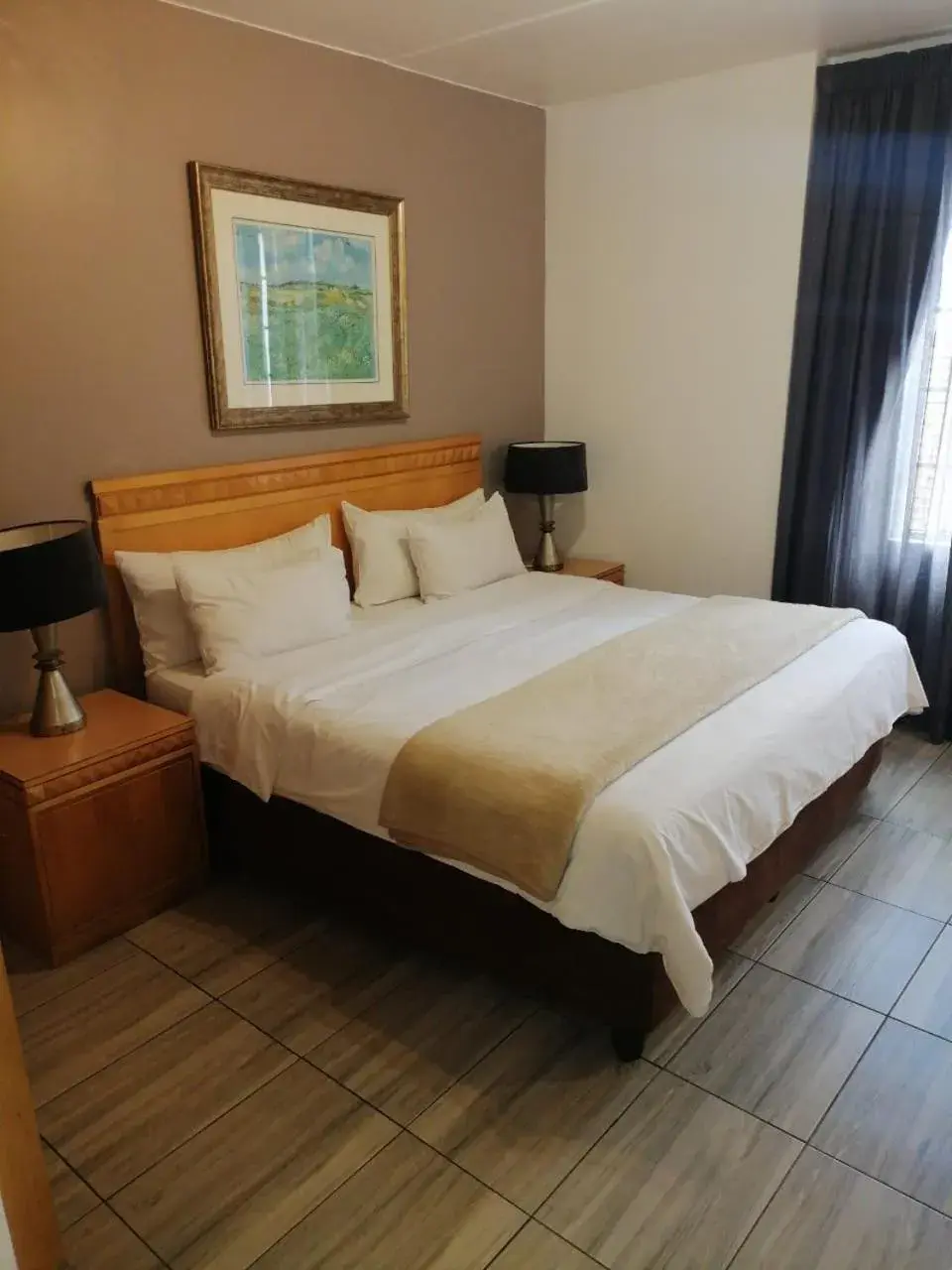 Bed in Airport Inn and Suites Bed in Airport Inn and Suites