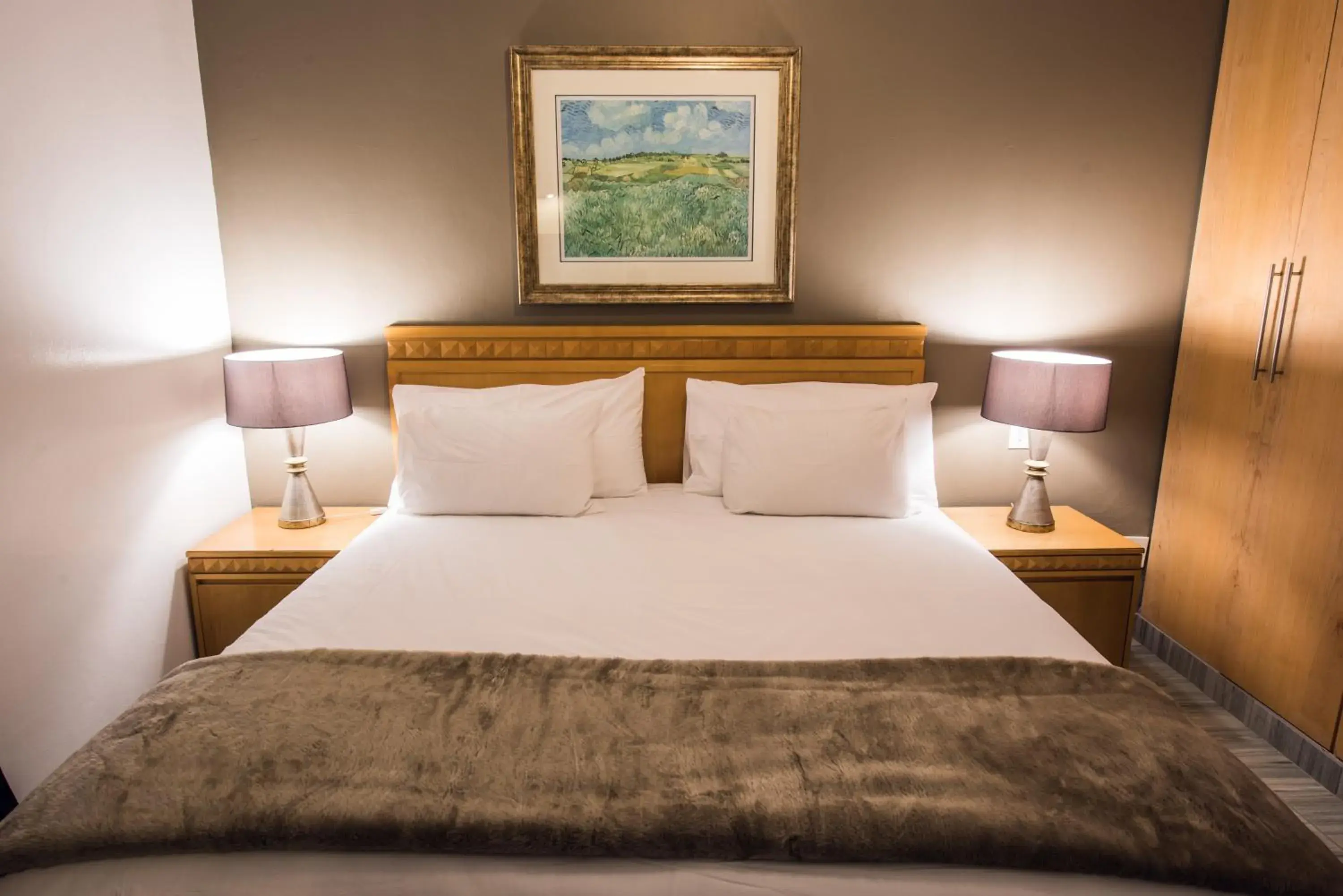 Bed in Airport Inn and Suites Bed in Airport Inn and Suites