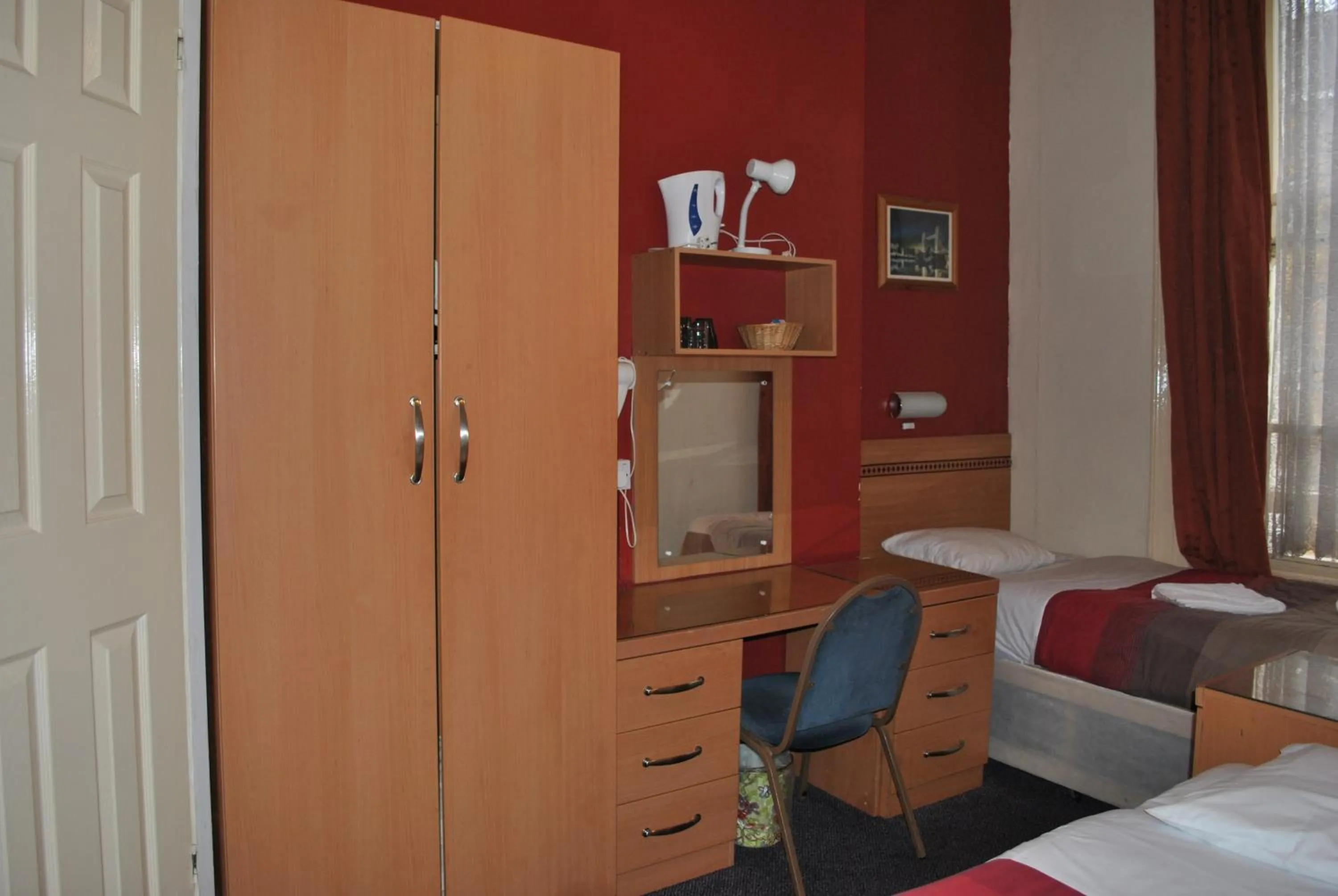 Decorative detail, Bed in Grenville House Hotel