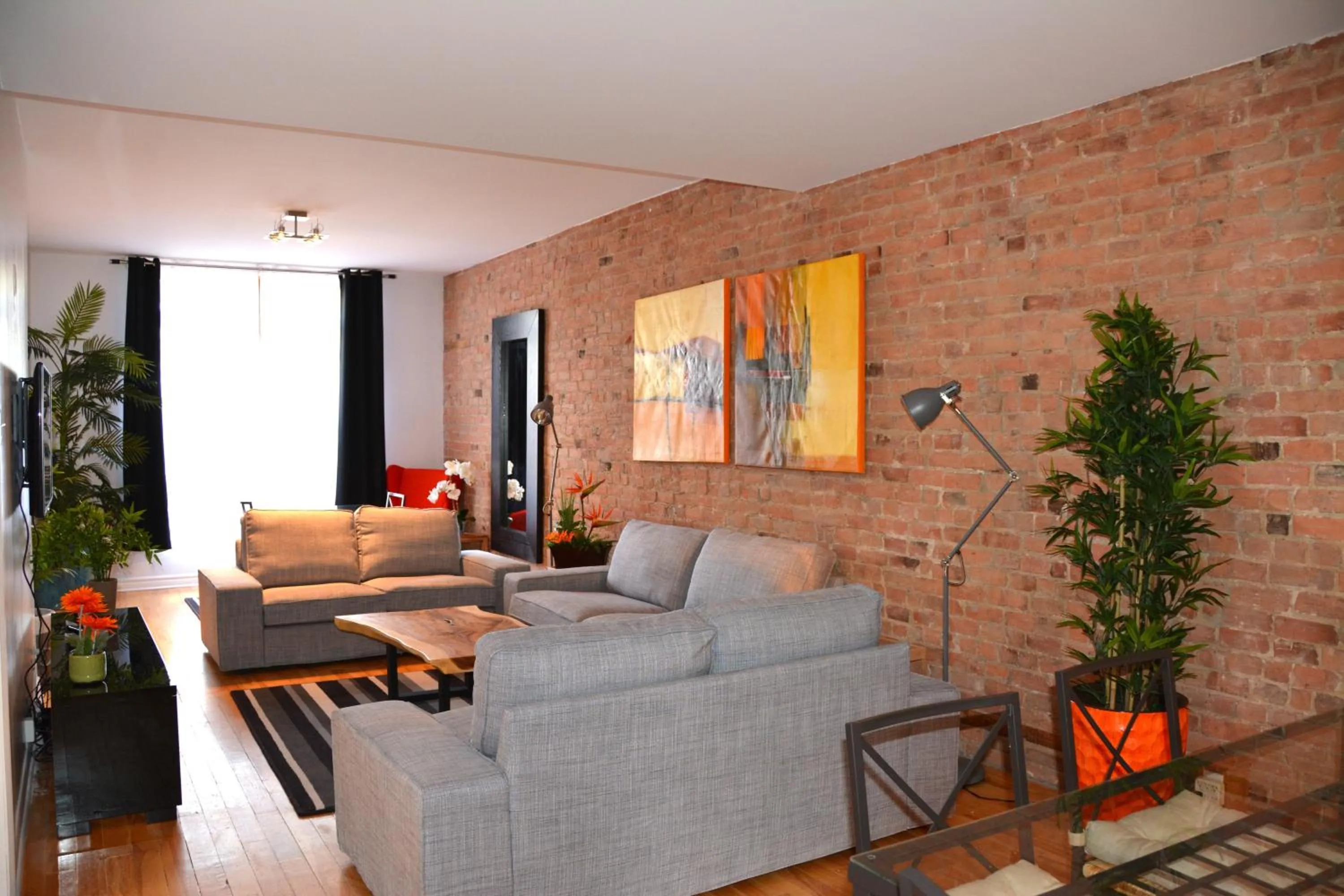 Living room in Le Metro Mont-Royal by HomeInMontreal