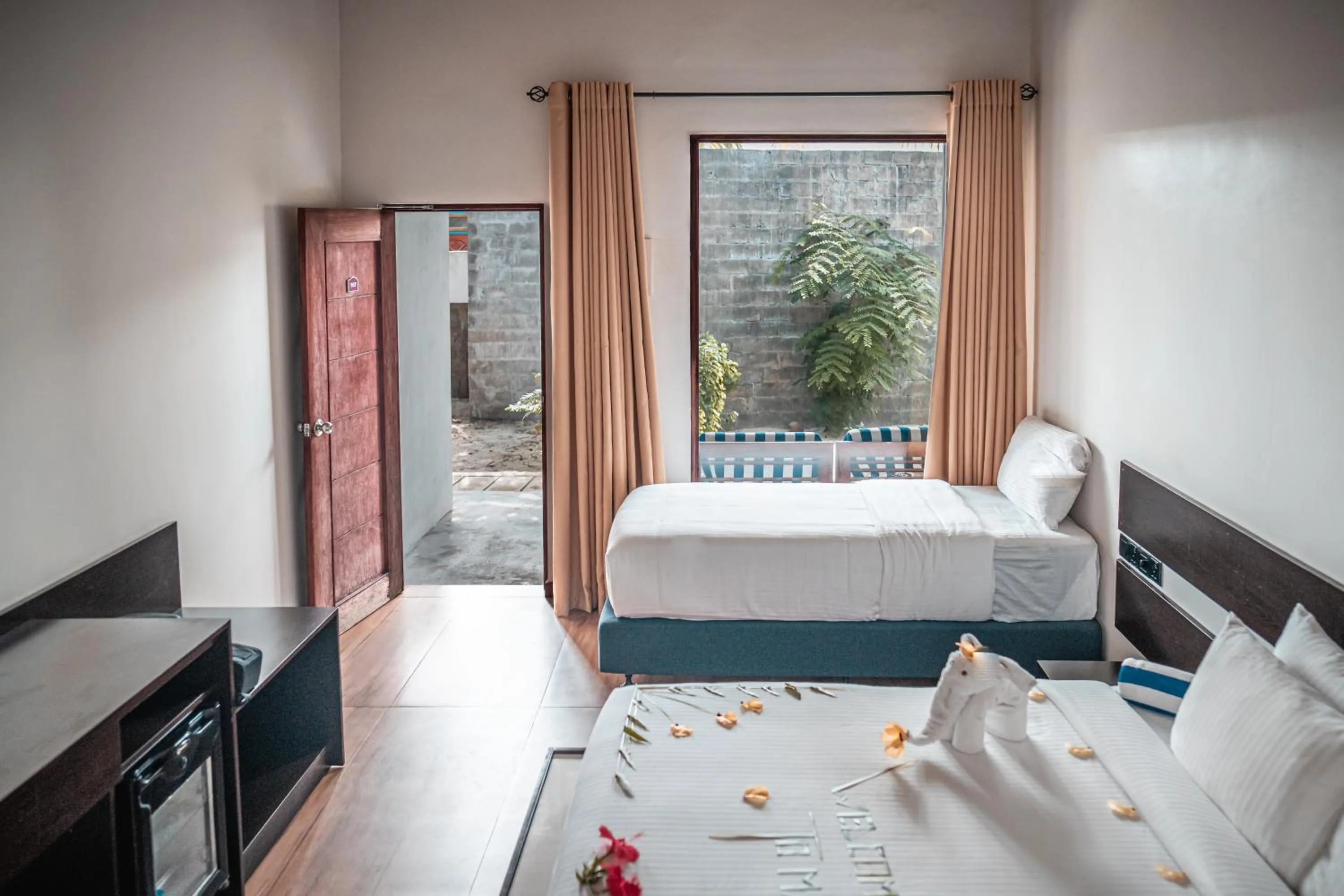 Bed in Madi Giri Guest House