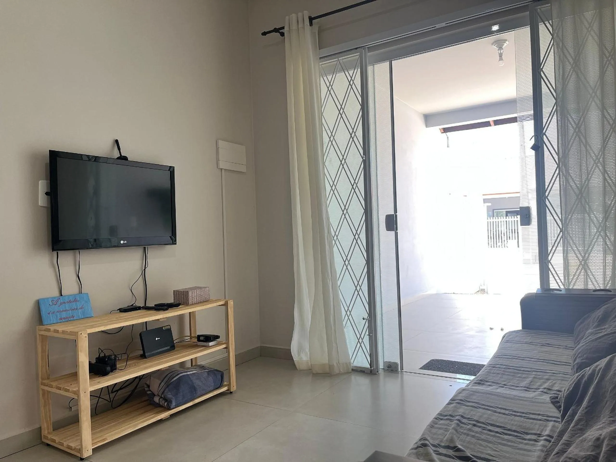 Living room in Apenas 700m do mar e 25min do Beto Carrero