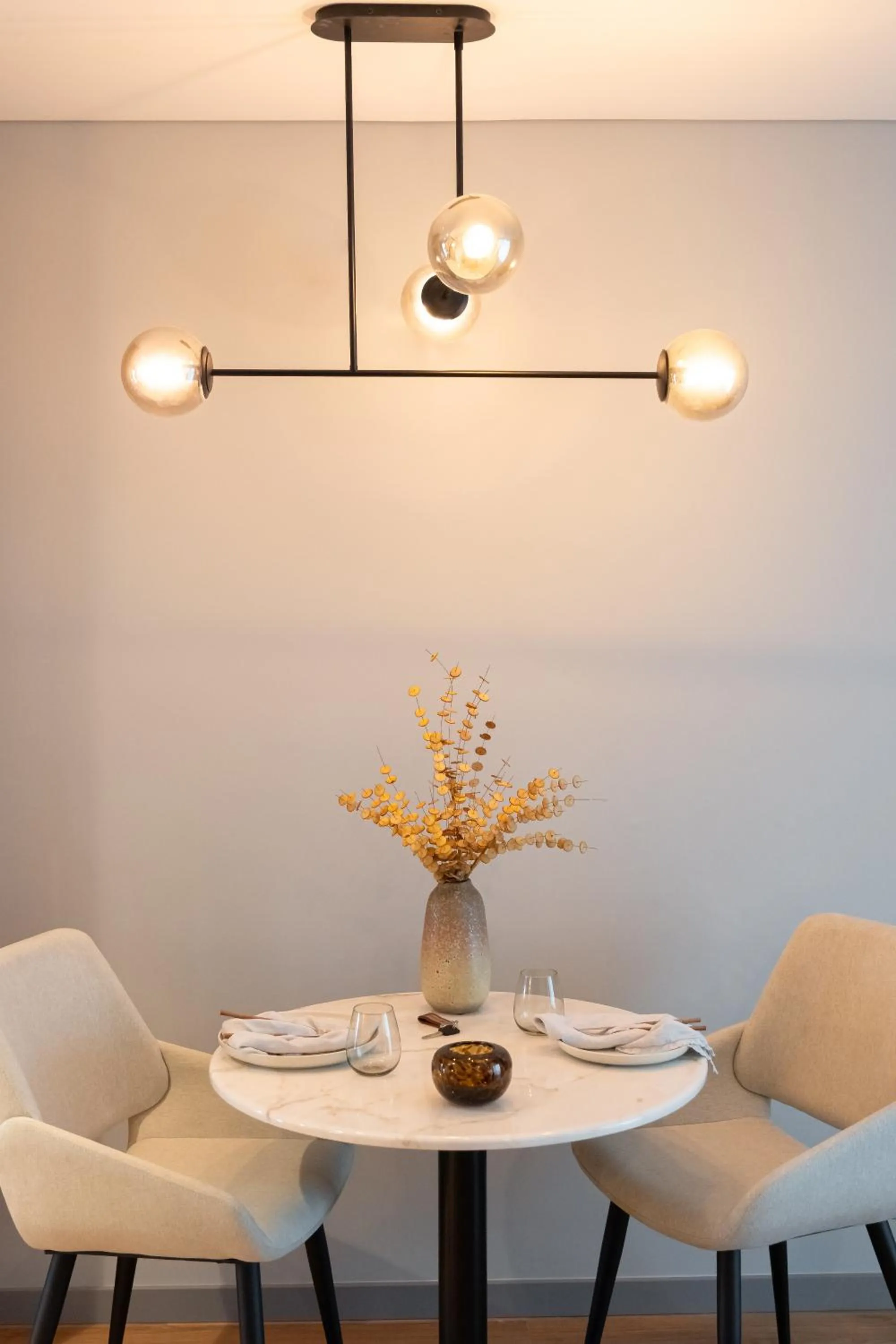 Dining area in Nôma Living Icon Apartments