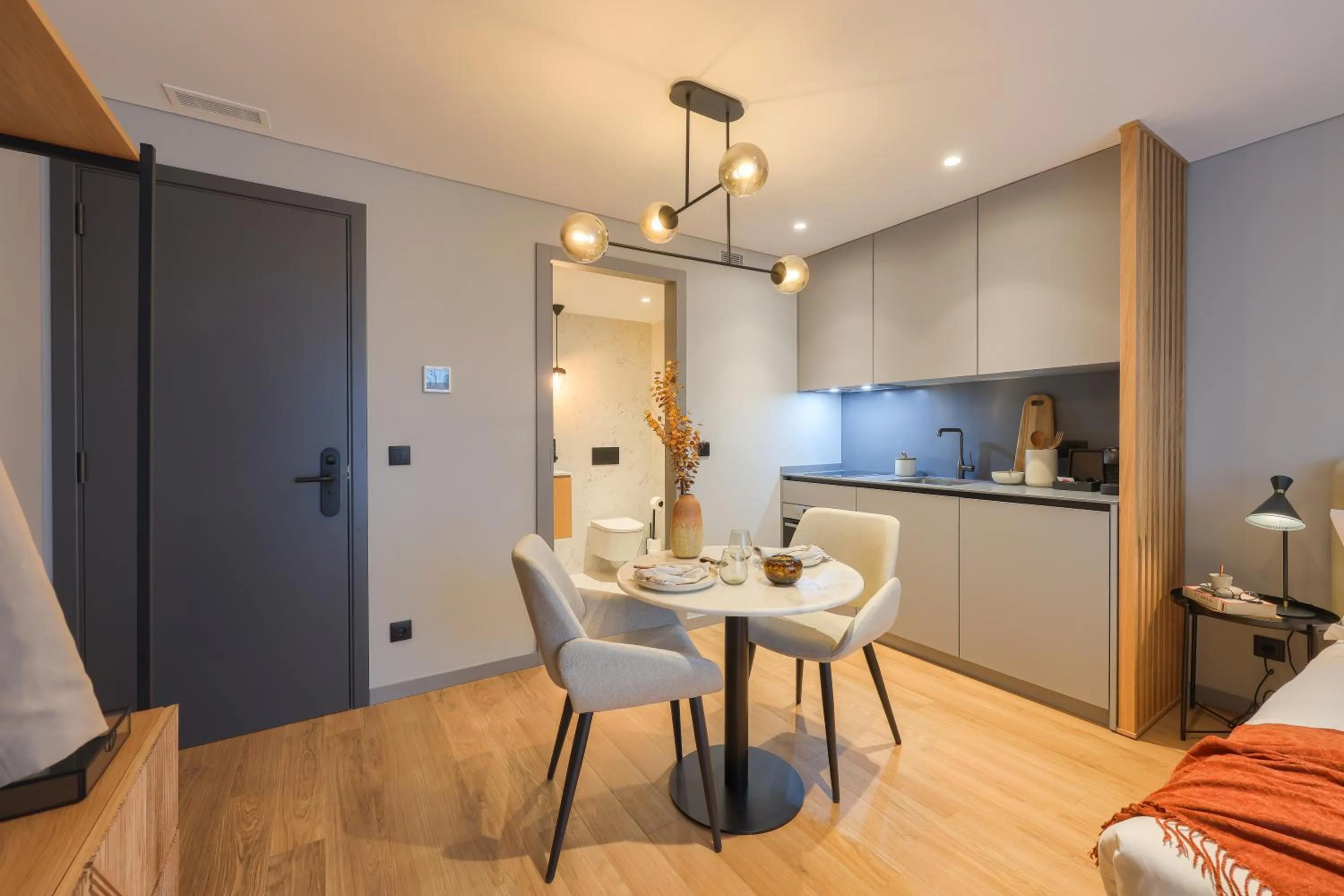 Bed in Nôma Living Icon Apartments