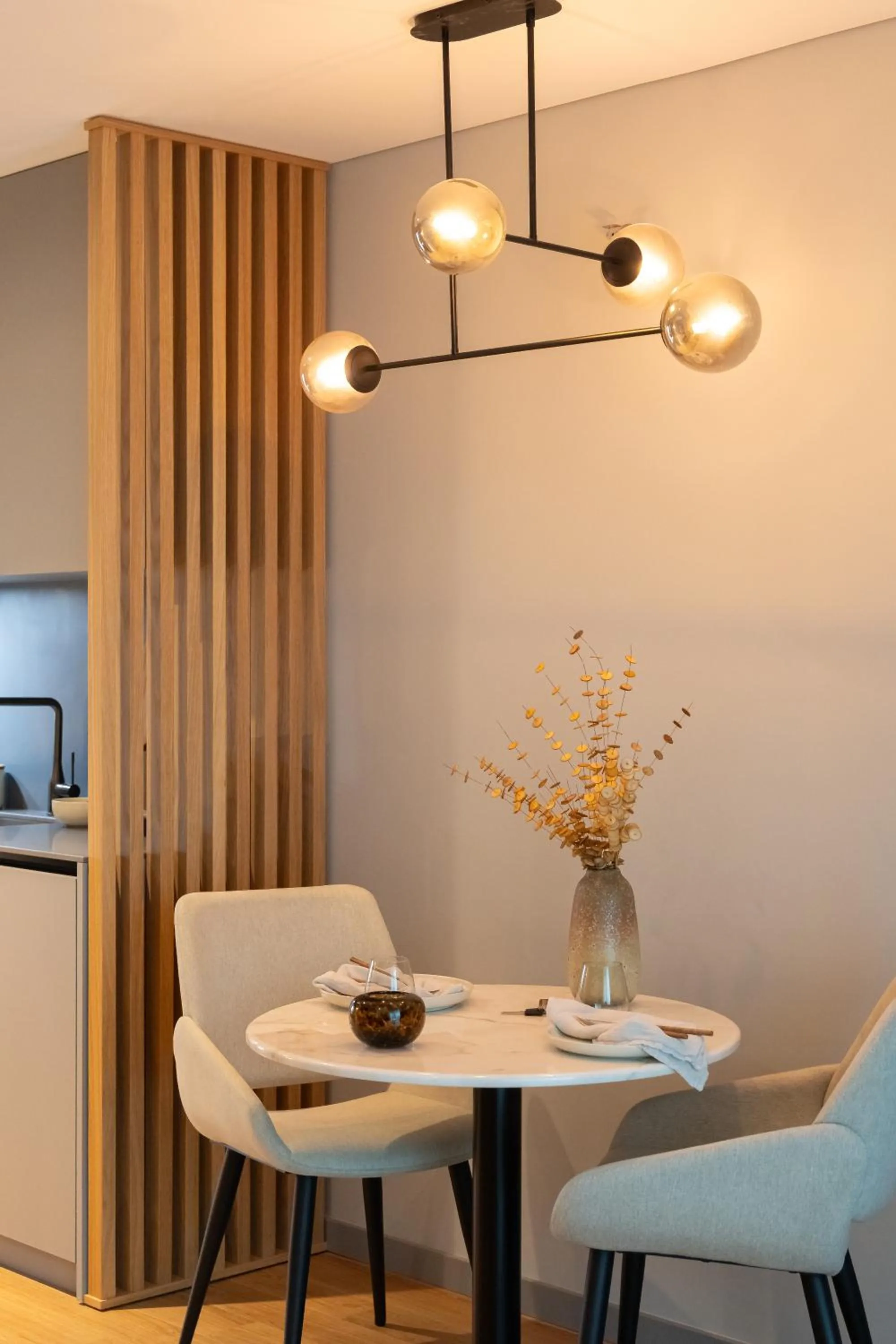Dining area in Nôma Living Icon Apartments