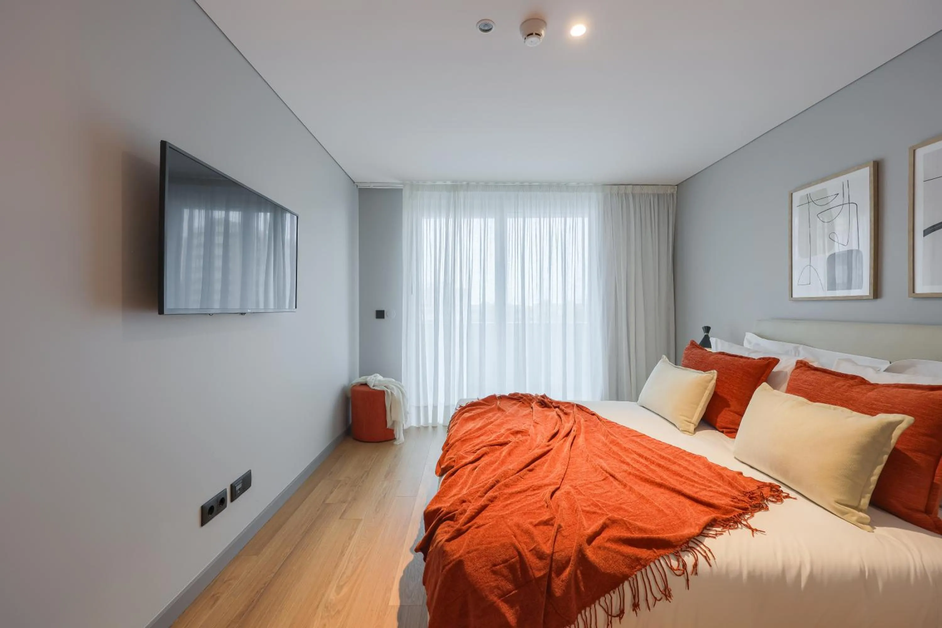 Bed in Nôma Living Icon Apartments