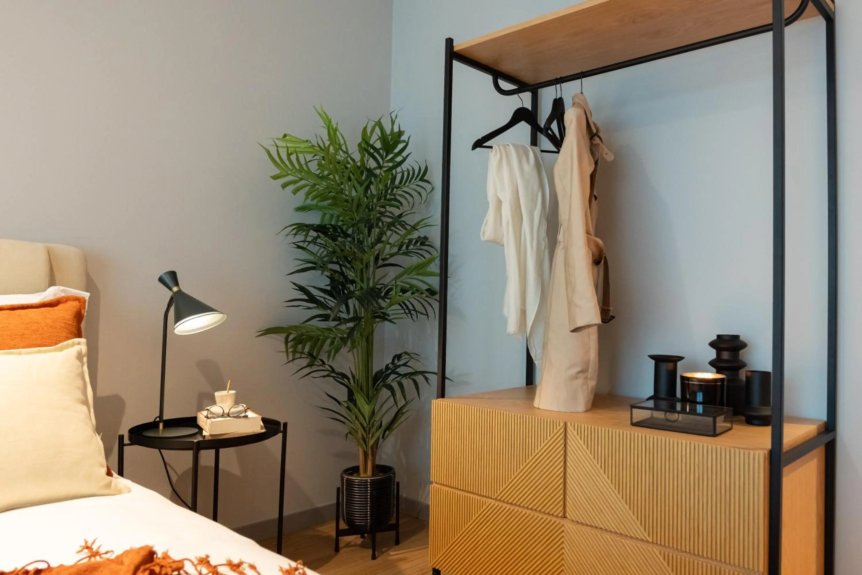 Bed in Nôma Living Icon Apartments