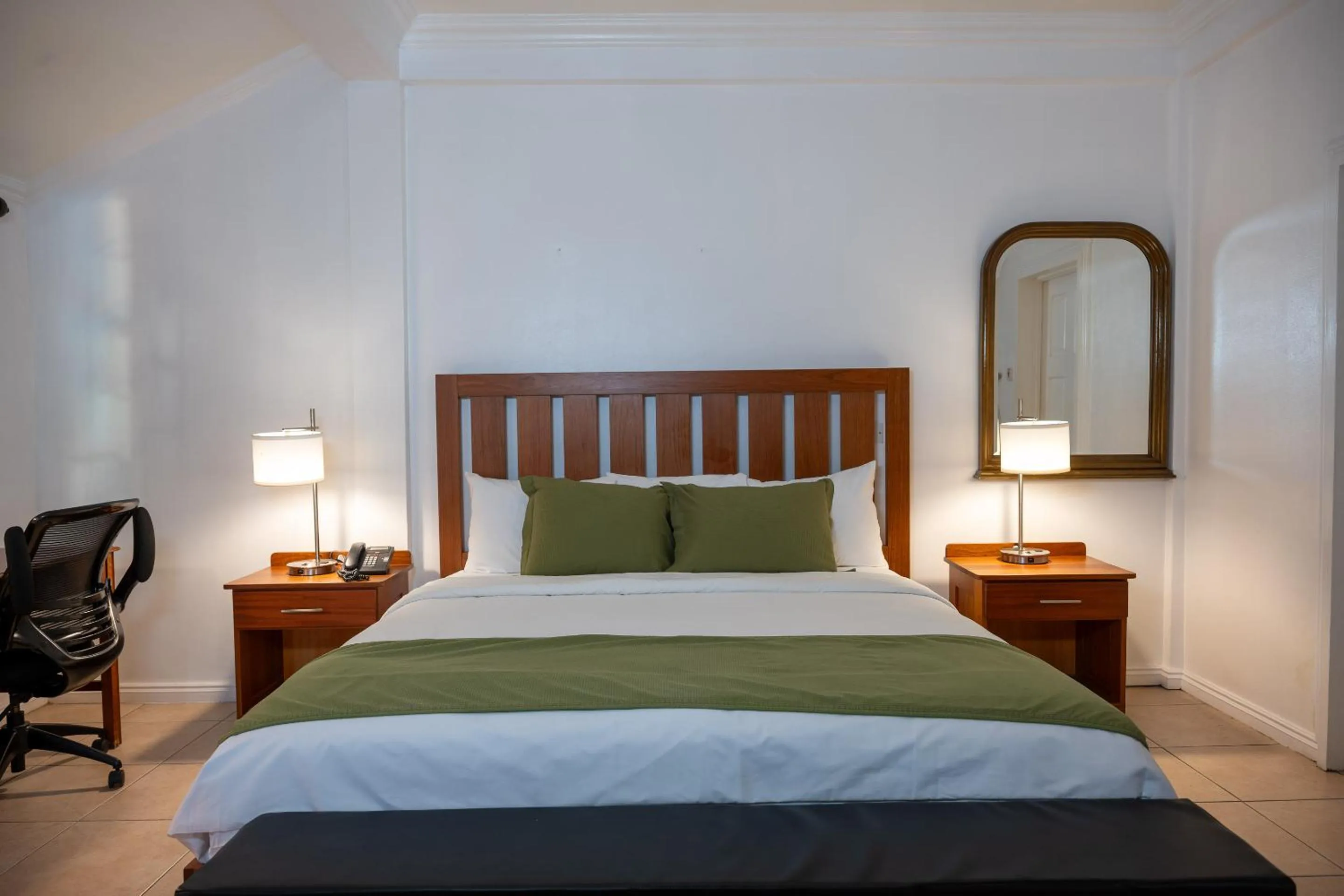 Bed in Grand Coastal Hotel