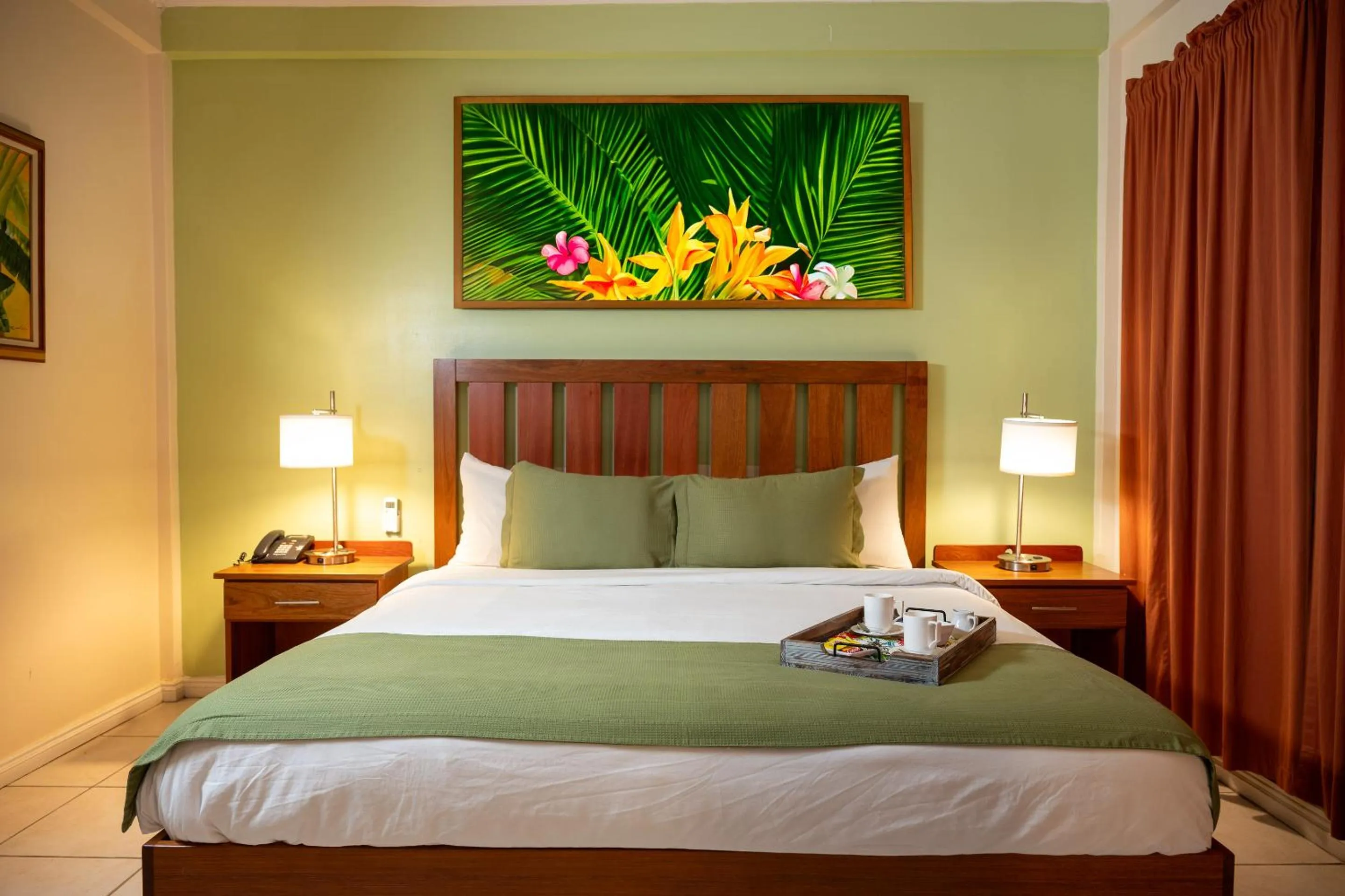 Bed in Grand Coastal Hotel