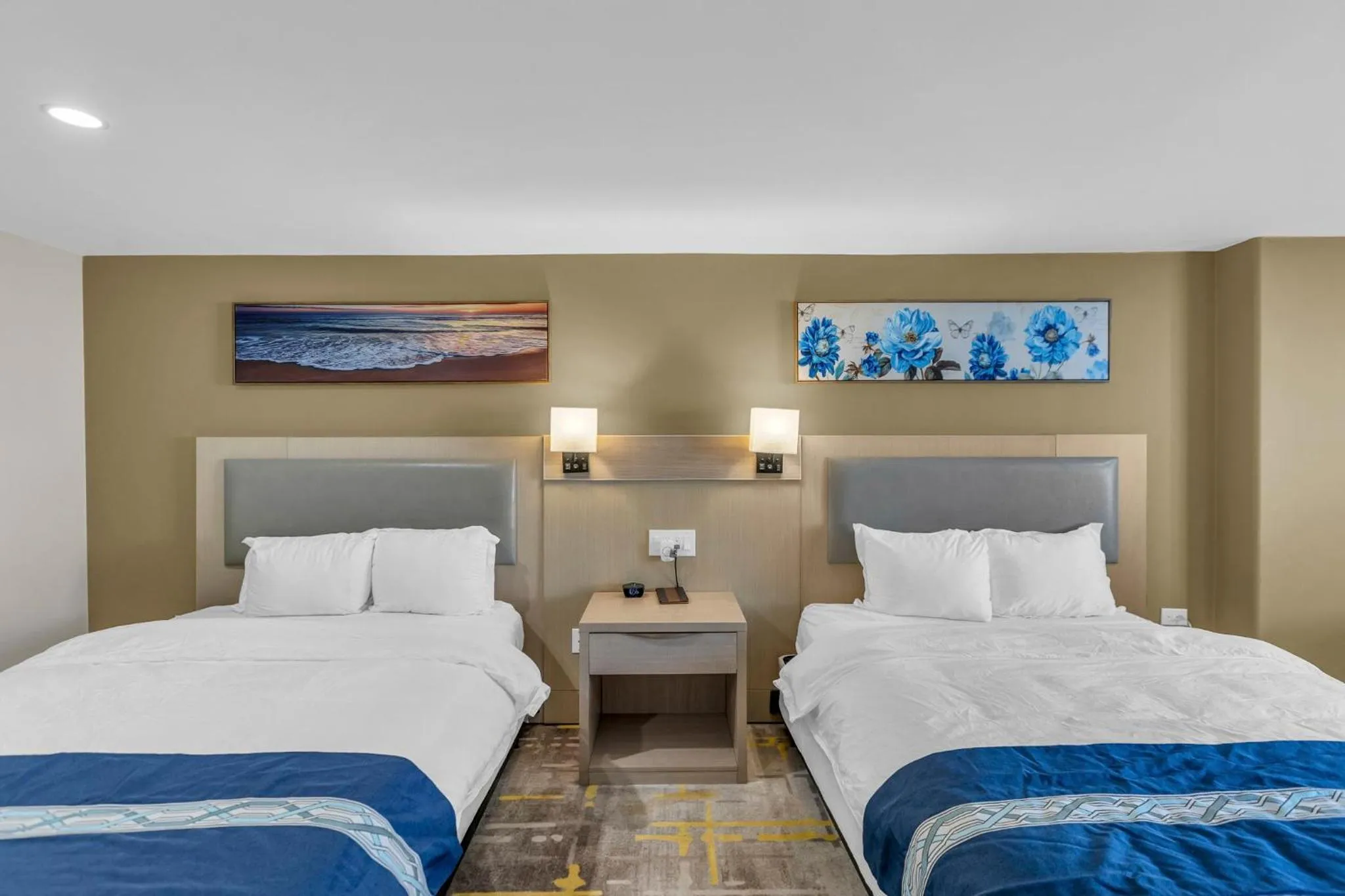 Bed in KC Inn Hotel Kansas City